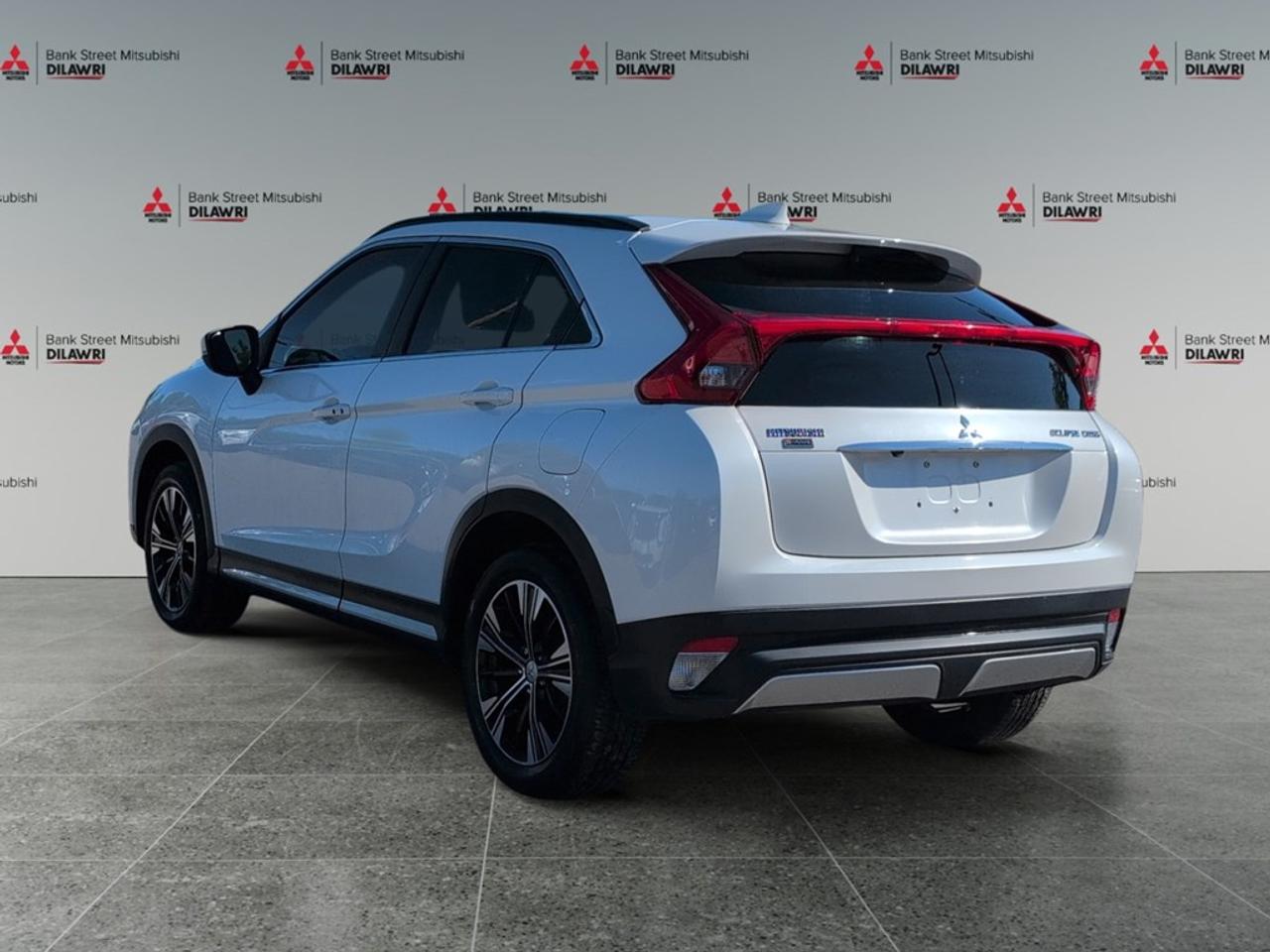 Balance of 5 year/100,000kms BASIC warranty and 10 year/160,000kms Factory Powertrain Warranty on ALL MITSUBISHI products! Best in the industry!!!! Experience the unparalleled capability of the 2018 Mitsubishi Eclipse Cross GT S-AWC, featuring a bold SUV design and a resilient 4x4 drivetrain. Perfect for tackling diverse terrains with ease, this vehicle promises both reliability and style. The exterior shines with sleek alloy wheels, making a statement of elegance and strength. Inside, youll find heated seats that ensure comfort on every journey and a spacious cabin crafted to accommodate all your needs. The intelligent design offers both style and practicality, making every drive enjoyable. Stay connected and entertained with the advanced smart device integration and satellite radio, offering endless entertainment options. Enjoy the peace of mind provided by safety features such as a backup camera, brake assist, and lane assist, adding an extra layer of security to your drives. The convenience of keyless entry, combined with power windows, simplifies your daily routine, while the Bluetooth connection allows seamless phone integration. This Mitsubishi Eclipse Cross GT S-AWC is ideal for those seeking a blend of performance, safety, and technology. Visit Bank Street Mitsubishi today to explore this versatile vehicle further and discover how it can elevate your driving experience.