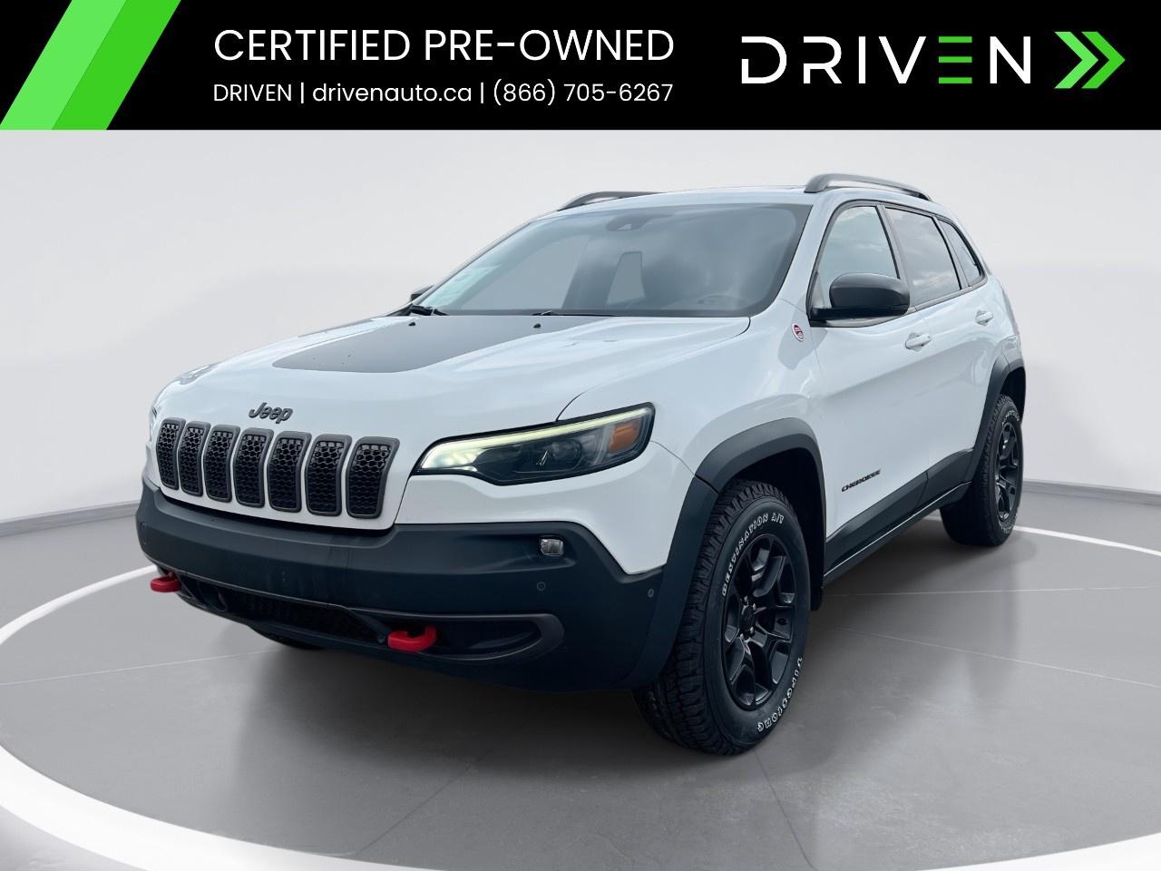 <p><strong>SPECIAL FINANCE PRICE: $26,495</strong></p><p><strong>CASH PRICE: $28,495</strong></p><p><span style=color:rgb( 0 , 0 , 0 )>Adventure-ready and packed with premium features, this Jeep Cherokee Trailhawk Elite is built to tackle any road. Loaded with <strong>rugged 4x4 capability, leather interior, panoramic sunroof, heated & ventilated front seats, heated steering wheel, premium audio, navigation</strong>, and <strong>remote start.</strong></span></p><p><span style=color:rgb( 0 , 0 , 0 )>Confidence comes standard with advanced safety features including <strong>blind spot monitoring, lane departure warning, adaptive cruise control, forward collision warning, rear park assist,</strong> and a <strong>backup camera.</strong></span></p> <p><span style=color:black>This vehicle is in<strong>excellent showroom condition</strong>and backed by the<strong>DRIVEN Certified Advantage Program</strong>for complete peace of mind.</span></p><p><span style=color:black><strong>INSPECTION & CERTIFICATION</strong></span></p><p><span style=color:black>This vehicle has undergone a<strong>comprehensive 150-point inspection</strong>by licensed in-house mechanics, assessing its cosmetic, mechanical, and safety condition. It comes<strong>DRIVEN Certified</strong>, which includes our<strong>30-Day / 2,500KM Vehicle Assurance Program</strong>covering any mechanical issues within that period.</span></p><p><span style=color:black><strong>DRIVEN CERTIFIED ADVANTAGE PROGRAM  INCLUDED FOR ALL BUYERS</strong></span></p><p><span style=color:black> 30-Day / 2,500KM Vehicle Assurance Program  Ontario-wide delivery available  Free Carfax Vehicle History Report  Access to Industry-Leading Warranty & GAP Programs  WALKAWAY Protection Available  Fresh Oil Change & New Cabin Air Filter  Meticulously Reconditioned & Professionally Detailed Vehicles</span></p><p><span style=color:black><strong>FINANCING AVAILABLE</strong></span></p><p><span style=color:black>All credit types are welcome! Whether youre a<strong>first-time buyer</strong>,<strong>newcomer to Canada</strong>, or<strong>rebuilding credit</strong>, our<strong>Equifax Certified Finance Team</strong>works to secure your best approval.</span></p><p><span style=color:black>Special Financing Programs are available for an additional<strong>$999</strong>, covering the expert services we provide to secure the<strong>lowest rates, best approvals, and most flexible terms</strong>.</span></p><p><span style=color:black>The<strong>Special Finance Price</strong>reflects a dealer discount and is available only when financing is arranged through<strong>DRIVEN</strong>, on approved credit (O.A.C.). Customers paying cash or using outside financing will pay the full<strong>cash price</strong>listed above.</span></p><p><span style=color:black><strong>CONVENIENCE & EXPERIENCE</strong></span></p><p><span style=color:black> State-of-the-Art Facility in Newmarket, ON  Hundreds of 5-Star Google Reviews  Recognized for expertise and trust  Transparent, Pressure-Free Consultations  Top Dollar for Trades  Well buy your vehicle even if you dont buy ours</span></p><p><span style=color:black><strong>ABOUT DRIVEN</strong></span></p><p><span style=color:black><strong>DRIVEN</strong> Anything but your typical dealership. Your one-stop destination for<strong>buying, selling, and servicing vehicles</strong>, built on transparency, trust, and a people-first approach.</span></p><p><span style=color:black>Visit us today at<strong>220 Mulock Drive, Newmarket, ON L3Y 9B7</strong> Or explore our full inventory and get<strong>pre-approved in minutes</strong>with<strong>no credit impact</strong>at</span><a target=_blank rel=noopener noreferrer nofollow href=http://www.drivenauto.ca><span style=color:blue>www.drivenauto.ca</span></a></p><p><span style=color:black>In accordance with<strong>OMVIC regulations</strong>, the listed<strong>cash price</strong>is the total all-in price excluding taxes and licensing. The<strong>Special Financing Price</strong>reflects dealer incentives available only when financing is arranged through DRIVEN (O.A.C.).</span></p><p><span style=color:black>***Although every effort is made to ensure accuracy, we are not responsible for any errors or omissions. Prices and availability may change without notice. Please call or email us directly to confirm details.***</span></p>