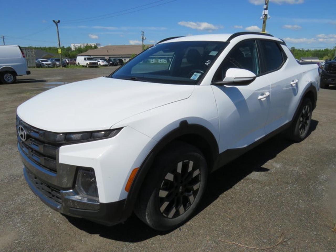 New Price!Atlas White 2025 Hyundai Santa Cruz Preferred AWD Shiftronic 2.5L I418 x 7.5J Aluminum Wheels, 3.316 Axle Ratio, 4-Wheel Disc Brakes, 6 Speakers, ABS brakes, Air Conditioning, Alloy wheels, AM/FM radio: SiriusXM, Apple CarPlay & Android Auto, Auto High-beam Headlights, Automatic temperature control, Brake assist, Bumpers: body-colour, Cloth Seat Trim, Compass, Delay-off headlights, Driver door bin, Driver vanity mirror, Dual front impact airbags, Dual front side impact airbags, Electronic Stability Control, Emergency communication system: Bluelink, Exterior Parking Camera Rear, Four wheel independent suspension, Front anti-roll bar, Front Bucket Seats, Front dual zone A/C, Front reading lights, Fully automatic headlights, Heated (3-Steps) Front Bucket Seats, Heated door mirrors, Heated front seats, Heated steering wheel, Illuminated entry, Leather Shift Knob, Leather steering wheel, Low tire pressure warning, Occupant sensing airbag, Outside temperature display, Overhead airbag, Overhead console, Panic alarm, Passenger door bin, Passenger vanity mirror, Power door mirrors, Power steering, Power windows, Radio data system, Radio: AM/FM/HD Radio/MP3/XM Audio System, Rear anti-roll bar, Rear side impact airbag, Rear step bumper, Rear window defroster, Remote keyless entry, Security system, Speed control, Speed-sensing steering, Split folding rear seat, Spoiler, Steering wheel mounted audio controls, Tachometer, Telescoping steering wheel, Tilt steering wheel, Traction control, Trip computer, Turn signal indicator mirrors, Variably intermittent wipers.Certification Program Details: 80 Point Inspection Fresh Oil Change Full Vehicle Detail Full tank of Gas 2 Years Fresh MVI Brake through InspectionAt Steele GMC Buick Fredericton, were proud to be your Used Car Mega Center serving drivers all across Atlantic Canada from Fredericton, Oromocto, New Maryland, Woodstock, Saint John, and Moncton in New Brunswick, to Nova Scotia, Prince Edward Island, and Newfoundland. Our inventory features all makes and models of used cars, trucks, SUVs, and vans, giving you the best selection in the region. Whether you need a fuel-efficient sedan, a family SUV, or a rugged pickup, youll find it right here at Steele GMC Buick Fredericton. With our Market Value Pricing, every vehicle is priced based on real-time market conditions, ensuring you get the best possible deal without the hassle of negotiating. We keep pricing transparent and competitive so you can shop with total confidence. No matter your credit situation good, bad, or no credit at all youre approved. Our finance experts work with lenders across Atlantic Canada to find the best terms for your budget, including second-chance financing, newcomer programs, and credit rebuilding solutions. As part of Steele Auto Group, Atlantic Canadas most diversified automotive group with 47 dealerships representing 27 brands, we offer unmatched selection, buying power, and customer support. That means if the vehicle you want isnt on our Fredericton lot, we can source it quickly from our massive dealer network across the Maritimes. When it comes to used vehicles, Steele GMC Buick Fredericton is the destination for drivers all across Atlantic Canada delivering market value pricing, every make and model, and guaranteed credit approval so you can get on the road with confidence.Steele Auto Group is the most diversified group of automobile dealerships in Atlantic Canada, with 47 dealerships selling 27 brands and an employee base of well over 2300.
