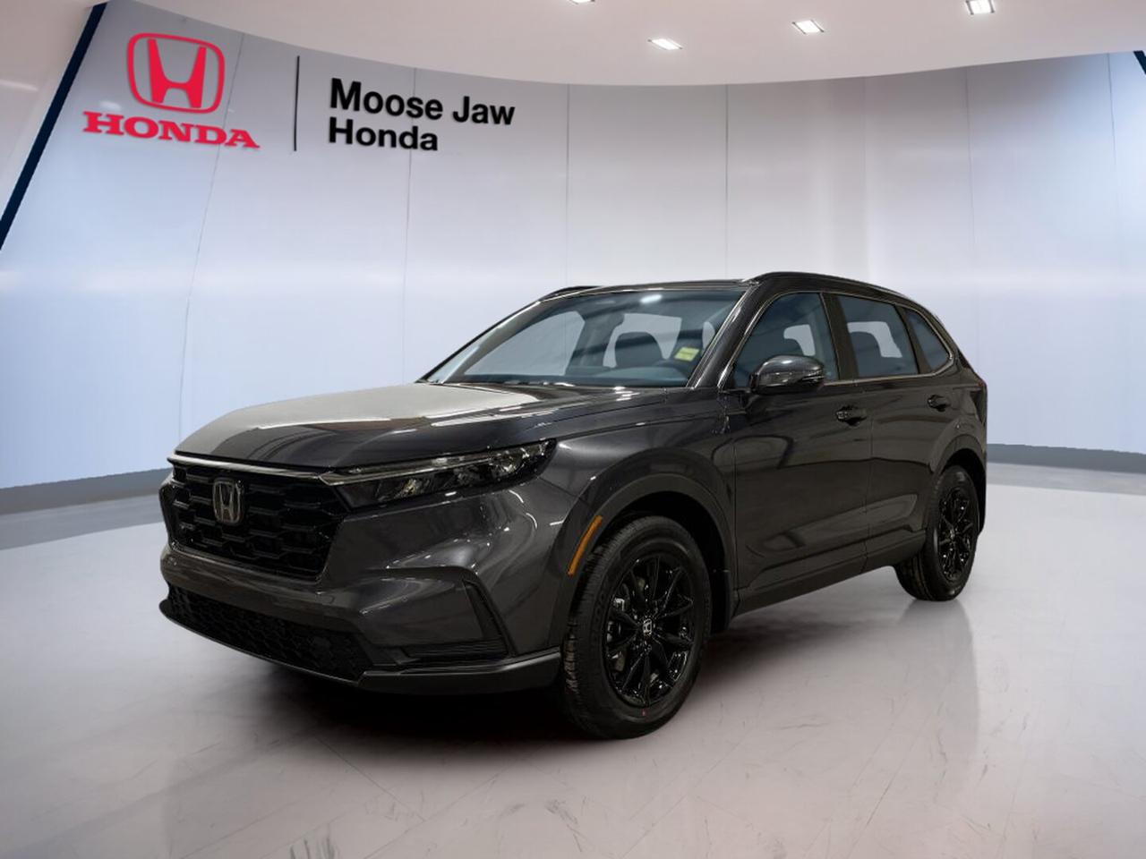 Meet the brand new 2026 Honda CR-V Sport at Moose Jaw Honda in Moose Jaw. Finished in Grey with a Black interior, this compact SUV blends everyday versatility with a confident look and smart utility. The 2026 Honda CR-V Sport is built for Canadian driving with all-wheel drive, a smooth continuously variable transmission, and a responsive turbocharged engine.

Designed for busy days, weekend trips, and changing road conditions, the 2026 Honda CR-V Sport delivers the comfort and flexibility drivers want in a modern SUV. Its 1.5-litre 16-valve DOHC turbocharged 4-cylinder engine gives you strong usable power, while the all-wheel-drive system helps add control when roads turn wet, snowy, or uneven.

FEATURES OF THE CR-V Sport

»» Grey exterior with sporty CR-V styling
»» Black interior with clean modern layout
»» All-wheel drive for added confidence
»» Turbocharged engine with smooth CVT

ADVANCED SAFETY FEATURES

»» Honda Sensing driver-assist technology suite included
»» Collision mitigation braking helps reduce risk
»» Lane keeping assist supports highway driving
»» Road departure mitigation adds extra confidence

PERFORMANCE AND EFFICIENCY

»» 1.5-litre turbocharged four-cylinder engine power
»» Continuously variable transmission delivers smooth response
»» All-wheel drive supports year-round traction
»» Efficient design suits daily commuting needs

COMFORT AND CONVENIENCE

»» Spacious cabin with practical everyday comfort
»» Dual-zone climate control helps cabin comfort
»» Four-door SUV access makes entry easy
»» Flexible seating supports passengers and cargo

TECHNOLOGY AND CONNECTIVITY

»» Clear infotainment screen for daily use
»» Bluetooth connectivity supports hands-free communication
»» Driver information display keeps data visible
»» USB connectivity helps keep devices powered

CARGO SPACE

»» Wide rear cargo area adds utility
»» Split folding rear seats expand storage
»» Low load floor helps everyday packing
»» Great space for errands or travel

WHAT OTHER OWNERS LIKE

»» Comfortable ride quality for daily driving
»» Useful cargo room for active lifestyles
»» Confident all-wheel-drive performance in winter
»» Smooth turbo power with easy response

The 2026 Honda CR-V Sport is a smart choice for drivers who want one vehicle that can do more. It offers the elevated seating position many SUV shoppers prefer, along with practical interior space and the efficiency benefits of a compact design. For commuting, family use, and road trips across Saskatchewan, it brings a balanced mix of comfort, traction, and versatility.

This SUV also stands out with its clean shape, well-organized cabin, and easy-to-live-with driving manners. The Grey exterior gives it a refined look, while the Black interior keeps the cabin timeless and functional. If you want a brand new Honda SUV with turbocharged performance, all-wheel drive, and everyday practicality, the 2026 Honda CR-V Sport deserves a close look at Moose Jaw Honda.

This 2026 Honda CR-V Sports VIN is: 2HKRS4H51TH114637.<p>Meet the brand new 2026 Honda CR-V Sport at Moose Jaw Honda in Moose Jaw. Finished in Grey with a Black interior</p>
<p> this compact SUV blends everyday versatility with a confident look and smart utility. The 2026 Honda CR-V Sport is built for Canadian driving with all-wheel drive</p>
<p> the 2026 Honda CR-V Sport delivers the comfort and flexibility drivers want in a modern SUV. Its 1.5-litre 16-valve DOHC turbocharged 4-cylinder engine gives you strong usable power</p>
<p> or uneven.

FEATURES OF THE CR-V Sport

»» Grey exterior with sporty CR-V styling
»» Black interior with clean modern layout
»» All-wheel drive for added confidence
»» Turbocharged engine with smooth CVT

ADVANCED SAFETY FEATURES

»» Honda Sensing driver-assist technology suite included
»» Collision mitigation braking helps reduce risk
»» Lane keeping assist supports highway driving
»» Road departure mitigation adds extra confidence

PERFORMANCE AND EFFICIENCY

»» 1.5-litre turbocharged four-cylinder engine power
»» Continuously variable transmission delivers smooth response
»» All-wheel drive supports year-round traction
»» Efficient design suits daily commuting needs

COMFORT AND CONVENIENCE

»» Spacious cabin with practical everyday comfort
»» Dual-zone climate control helps cabin comfort
»» Four-door SUV access makes entry easy
»» Flexible seating supports passengers and cargo

TECHNOLOGY AND CONNECTIVITY

»» Clear infotainment screen for daily use
»» Bluetooth connectivity supports hands-free communication
»» Driver information display keeps data visible
»» USB connectivity helps keep devices powered

CARGO SPACE

»» Wide rear cargo area adds utility
»» Split folding rear seats expand storage
»» Low load floor helps everyday packing
»» Great space for errands or travel

WHAT OTHER OWNERS LIKE

»» Comfortable ride quality for daily driving
»» Useful cargo room for active lifestyles
»» Confident all-wheel-drive performance in winter
»» Smooth turbo power with easy response

The 2026 Honda CR-V Sport is a smart choice for drivers who want one vehicle that can do more. It offers the elevated seating position many SUV shoppers prefer</p>
<p> while the Black interior keeps the cabin timeless and functional. If you want a brand new Honda SUV with turbocharged performance</p>
<p> the 2026 Honda CR-V Sport deserves a close look at Moose Jaw Honda.

This 2026 Honda CR-V Sports VIN is: 2HKRS4H51TH114637.</p>