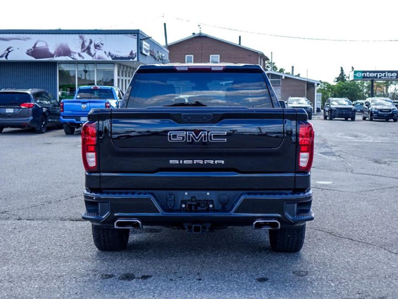 2024 GMC Sierra 1500 Elevation 4WD Crew Cab 147" 5.3L 6 Passenger Multi Pro Tailgate Photo