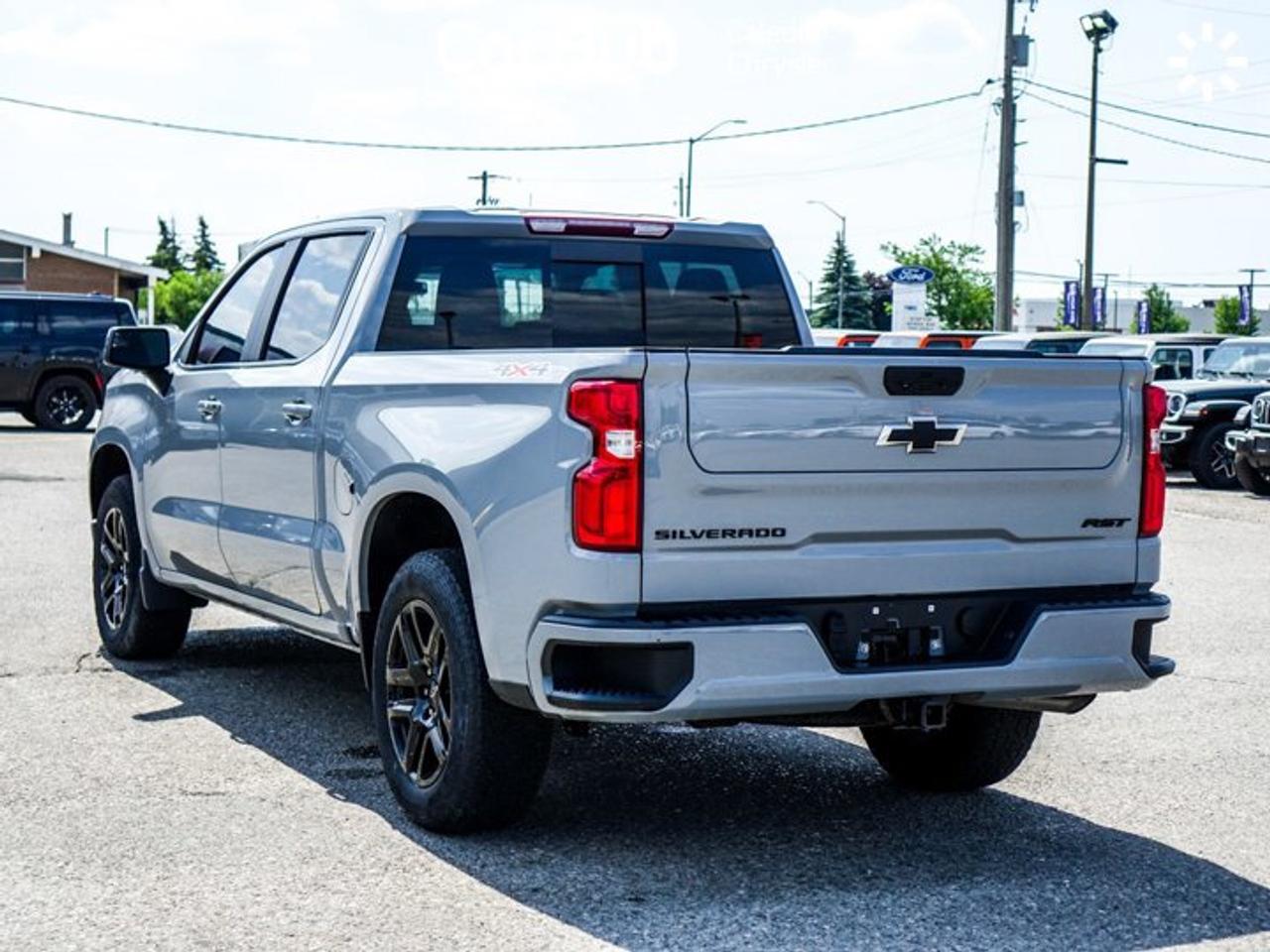 2024 Chevrolet Silverado 1500 RST 4WD Crew Cab 147"  5.3L Leather 5 passengers with captain chair Photo