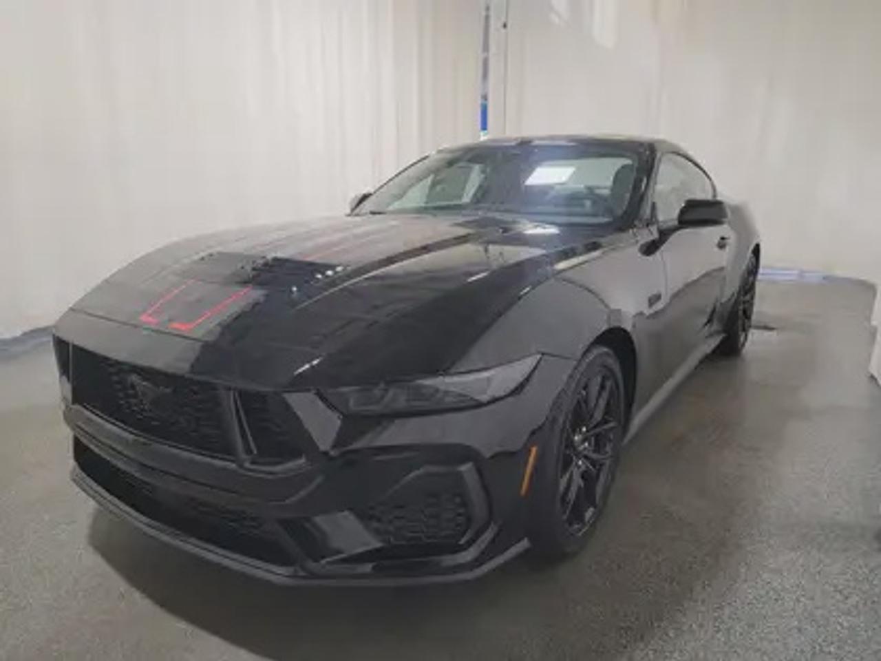 This new 2026 Ford Mustang GT Premium V8 looks eye-catching in the color Shadow Black. This fastback comes with the 5.0L V8 engine which connects you to the road with this 10-speed automatic transmission. This popular engine produces an incredible 486 horsepower and 418 lb.-ft of torque.  

Key Features:
Ford Co-Pilot 360 Technology 
Lane Keep Assist 
Heated Premium Trim Leather Seats
Heated Steering Wheel
Rear View Camera 
Adaptive Cruise Control
Rain Sensing Wipers 
Rear Parking Sensors 
SYNC 4W/ 9 Speaker Stereo System
Wireless Apple Car Play/Android Auto Connection 
Heated Seats
Ford Connectivity Package (1-year included)*
Active Anti-Theft System
13.2 LCD Touchscreen
Ambient Lighting w/ Mycolour
Pre- Collison Assist 
3.55 Limited-Slip Axle 
Dual-Zone Climate Control 
6-Way Power Drivers Seat & 4-Way Power Passenger Seat
GT Dual 3.5 Exhaust
Mustang Nite Pony Package
Engine Block Heater

This vehicle comes with the All-Weather Packageready to take on any season!
Snow, rain, mud, or sunshinethis vehicle is built for it all! The All-Weather Package adds extra protection where it matters most, with premium mud flaps to shield your paint from road debris, all-weather floor mats to protect your interior from lifes messes, and Xpel paint protection to help guard against those infuriating rock chips. Drive with confidence, knowing your investment is protected from Reginas elements.
 
Bennett Dunlop Ford, proudly serving Regina for over 40 years, is conveniently located at 770 Broad Street. With over 3,500 Google reviews, our reputation reflects our commitment to providing a fast, easy, and enjoyable vehicle-buying experience. We eliminate the hassle with no admin or documentation fees, transparent upfront pricing that lets you shop with total confidence. But were more than just a dealershipwere driven to make a difference by supporting local community initiatives and events that matter to you. Visit Bennett Dunlop Ford today and experience why were Reginas trusted choice for quality vehicles, exceptional service, and a genuine commitment to driving change in our community!
