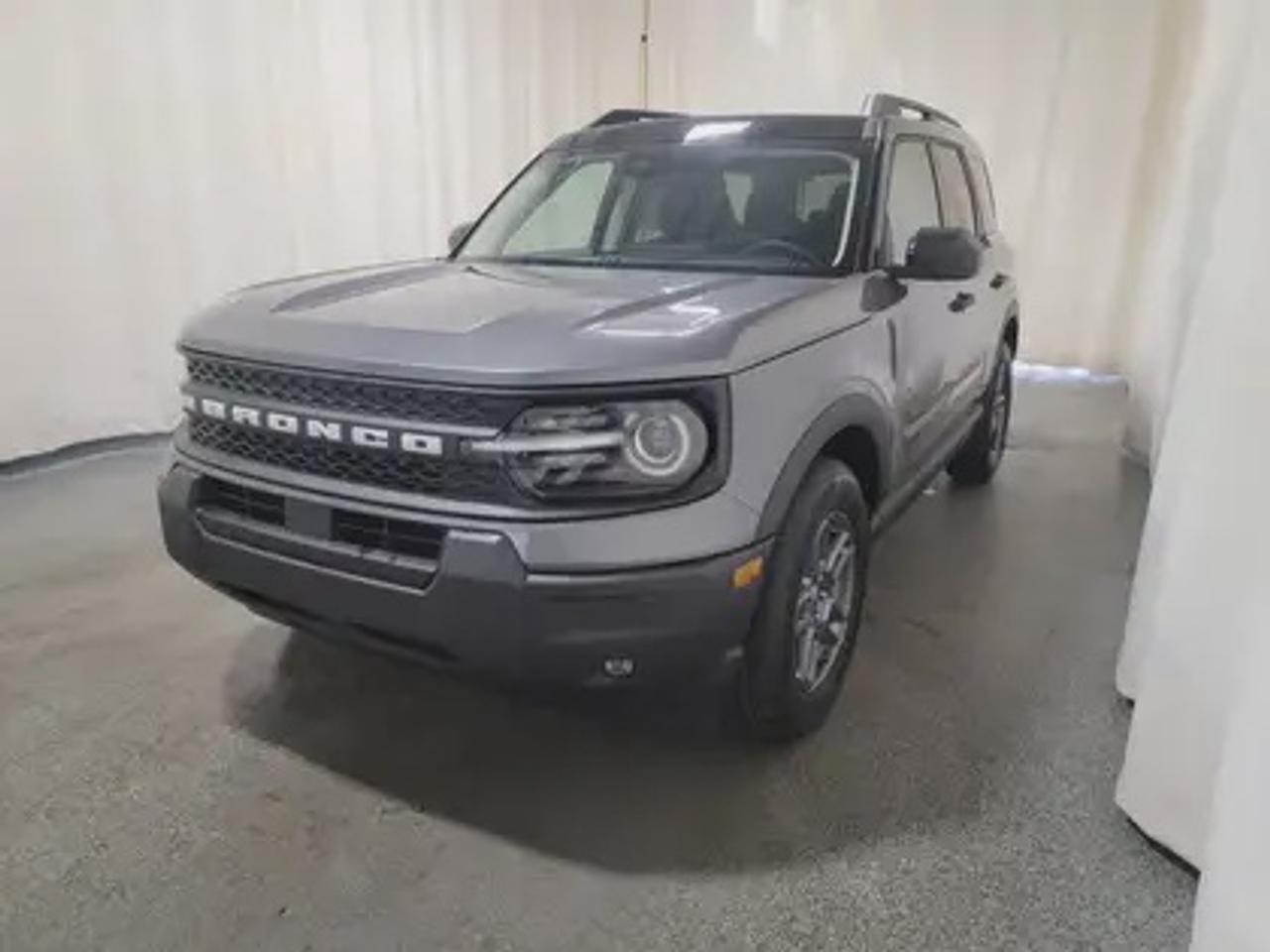 This rugged and refined 2026 Ford Bronco Sport Big Bend 200A stands out in Carbonized Grey. Built to tackle adventure and city streets alike, this 5-passenger SUV is powered by a 1.5L EcoBoost® engine, delivering 181 horsepower and 190 lb-ft of torque. Coupled with an 8-speed automatic transmission, the Bronco Sport offers impressive fuel efficiency and performance to match your lifestyle.

Key Features Include:
Heated Front Seats
13.2 Center Display
8-Way Power Drivers Seat
SYNC® 4 with a 13.2 Color Touchscreen
Ford Co-Pilot360 Assist+ featuring Adaptive Cruise Control with Stop & Go
Terrain Management System with 5 G.O.A.T. Modes
LED Headlamps, Fog Lamps, and Signature Lighting
17 Carbonized Grey-Painted High Gloss Aluminum Wheels
Wireless Apple CarPlay® and Android Auto Compatibility
Privacy Glass
Intelligent Access with Push-Button Start
Power Moonroof
Convenience Package

This vehicle comes with the All-Weather Packageready to take on any season!
Snow, rain, mud, or sunshinethis vehicle is built for it all! The All-Weather Package adds extra protection where it matters most, with premium mud flaps to shield your paint from road debris, all-weather floor mats to protect your interior from lifes messes, and Xpel paint protection to help guard against those infuriating rock chips. Drive with confidence, knowing your investment is protected from Reginas elements.

Bennett Dunlop Ford, proudly serving Regina for over 40 years, is conveniently located at 770 Broad Street. With over 3,500 Google reviews, our reputation reflects our commitment to providing a fast, easy, and enjoyable vehicle-buying experience. We eliminate the hassle with no admin or documentation fees, transparent upfront pricing that lets you shop with total confidence. But were more than just a dealershipwere driven to make a difference by supporting local community initiatives and events that matter to you. Visit Bennett Dunlop Ford today and experience why were Reginas trusted choice for quality vehicles, exceptional service, and a genuine commitment to driving change in our community!