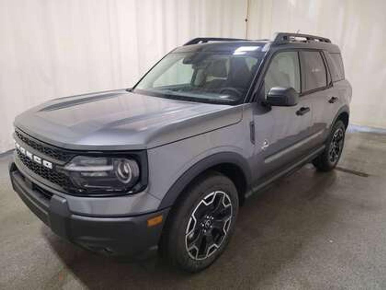This all-new 2026 Ford Bronco Sport Outer Banks 300A shines in Carbonized Grey. This 5-passenger compact SUV is powered by the 1.5L EcoBoost® engine, delivering 181 horsepower and 190 lb-ft of torque. With an 8-speed automatic transmission and Auto Start-Stop Technology, it offers a smooth yet efficient drive, ideal for city commutes or highway adventures.

Key Features:
Premium-Trimmed Sport Heated Front Seats
Premium-Wrapped Heated Steering Wheel
Rear Parking Sensors
Memory Drivers Seat 
6-Way Power Passenger Seat
Push-Button Start
SYNC® 4 with a 13.2-inch Center Display, Wireless Apple CarPlay® and Android Auto
18 Machined-Face Ebony Black-Painted Aluminum Wheels
Dual-Zone Temperature Control
Terrain Management System Electronic Automatic  with 5 G.O.A.T. Modes (Normal, ECO, Sport, Slippery, Off-Road)
LED Headlights, Fog Lights, and Signature Lights
FordPass® Connect with Remote Start

This vehicle comes with the All-Weather Packageready to take on any season!
Snow, rain, mud, or sunshinethis vehicle is built for it all! The All-Weather Package adds extra protection where it matters most, with premium mud flaps to shield your paint from road debris, all-weather floor mats to protect your interior from lifes messes, and Xpel paint protection to help guard against those infuriating rock chips. Drive with confidence, knowing your investment is protected from Regina's elements.

Bennett Dunlop Ford, proudly serving Regina for over 40 years, is conveniently located at 770 Broad Street. With over 3,500 Google reviews, our reputation reflects our commitment to providing a fast, easy, and enjoyable vehicle-buying experience. We eliminate the hassle with no admin or documentation fees, transparent upfront pricing that lets you shop with total confidence. But were more than just a dealershipwere driven to make a difference by supporting local community initiatives and events that matter to you. Visit Bennett Dunlop Ford today and experience why were Reginas trusted choice for quality vehicles, exceptional service, and a genuine commitment to driving change in our community!