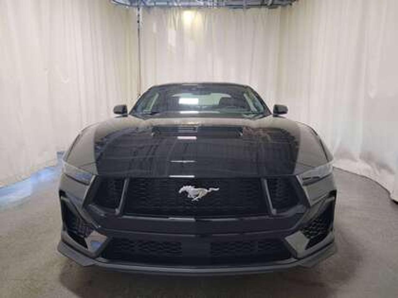 This new 2026 Ford Mustang GT Premium V8 looks eye-catching in the color Shadow Black. This fastback comes with the 5.0L V8 engine which connects you to the road with this 10-speed automatic transmission. This popular engine produces an incredible 486 horsepower and 418 lb.-ft of torque.  

Key Features:
Ford Co-Pilot 360 Technology 
Lane Keep Assist 
Heated Premium Trim Leather Seats
Heated Steering Wheel
Rear View Camera 
Adaptive Cruise Control
Rain Sensing Wipers 
Rear Parking Sensors 
SYNC 4W/ 9 Speaker Stereo System
Wireless Apple Car Play/Android Auto Connection 
Heated Seats
Ford Connectivity Package (1-year included)*
Active Anti-Theft System
13.2 LCD Touchscreen
Ambient Lighting w/ Mycolour
Pre- Collison Assist 
3.55 Limited-Slip Axle 
Dual-Zone Climate Control 
6-Way Power Drivers Seat & 4-Way Power Passenger Seat
GT Dual 3.5 Exhaust
GT Performance Package

This vehicle comes with the All-Weather Packageready to take on any season!
Snow, rain, mud, or sunshinethis vehicle is built for it all! The All-Weather Package adds extra protection where it matters most, with premium mud flaps to shield your paint from road debris, all-weather floor mats to protect your interior from lifes messes, and Xpel paint protection to help guard against those infuriating rock chips. Drive with confidence, knowing your investment is protected from Regina's elements.

Bennett Dunlop Ford, proudly serving Regina for over 40 years, is conveniently located at 770 Broad Street. With over 3,500 Google reviews, our reputation reflects our commitment to providing a fast, easy, and enjoyable vehicle-buying experience. We eliminate the hassle with no admin or documentation fees, transparent upfront pricing that lets you shop with total confidence. But were more than just a dealershipwere driven to make a difference by supporting local community initiatives and events that matter to you. Visit Bennett Dunlop Ford today and experience why were Reginas trusted choice for quality vehicles, exceptional service, and a genuine commitment to driving change in our community!