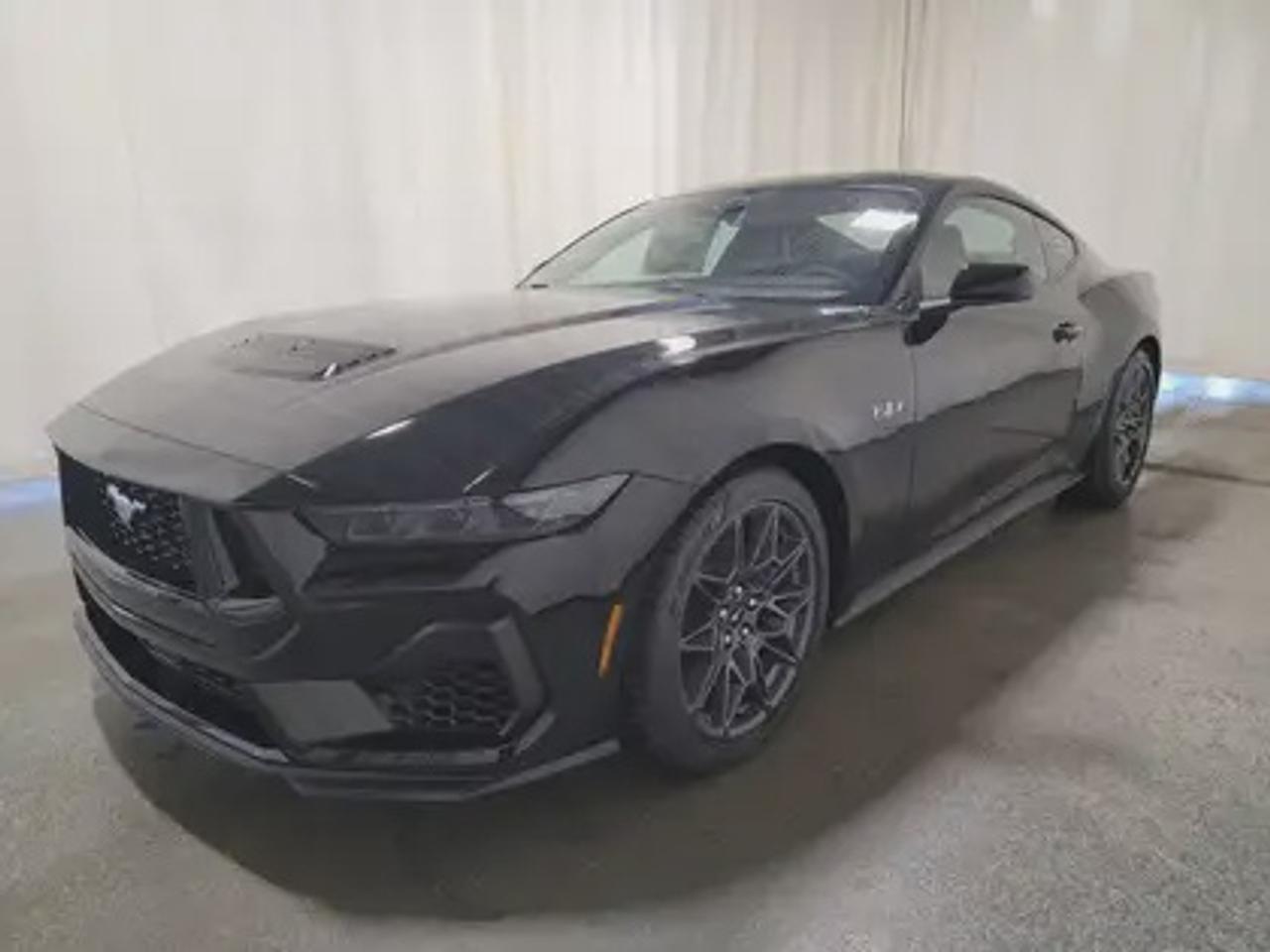 This new 2026 Ford Mustang GT Premium V8 looks eye-catching in the color Shadow Black. This fastback comes with the 5.0L V8 engine which connects you to the road with this 10-speed automatic transmission. This popular engine produces an incredible 486 horsepower and 418 lb.-ft of torque.  

Key Features:
Ford Co-Pilot 360 Technology 
Lane Keep Assist 
Heated Premium Trim Leather Seats
Heated Steering Wheel
Rear View Camera 
Adaptive Cruise Control
Rain Sensing Wipers 
Rear Parking Sensors 
SYNC 4W/ 9 Speaker Stereo System
Wireless Apple Car Play/Android Auto Connection 
Heated Seats
Ford Connectivity Package (1-year included)*
Active Anti-Theft System
13.2 LCD Touchscreen
Ambient Lighting w/ Mycolour
Pre- Collison Assist 
3.55 Limited-Slip Axle 
Dual-Zone Climate Control 
6-Way Power Drivers Seat & 4-Way Power Passenger Seat
GT Dual 3.5 Exhaust
GT Performance Package

This vehicle comes with the All-Weather Packageready to take on any season!
Snow, rain, mud, or sunshinethis vehicle is built for it all! The All-Weather Package adds extra protection where it matters most, with premium mud flaps to shield your paint from road debris, all-weather floor mats to protect your interior from lifes messes, and Xpel paint protection to help guard against those infuriating rock chips. Drive with confidence, knowing your investment is protected from Reginas elements.

Bennett Dunlop Ford, proudly serving Regina for over 40 years, is conveniently located at 770 Broad Street. With over 3,500 Google reviews, our reputation reflects our commitment to providing a fast, easy, and enjoyable vehicle-buying experience. We eliminate the hassle with no admin or documentation fees, transparent upfront pricing that lets you shop with total confidence. But were more than just a dealershipwere driven to make a difference by supporting local community initiatives and events that matter to you. Visit Bennett Dunlop Ford today and experience why were Reginas trusted choice for quality vehicles, exceptional service, and a genuine commitment to driving change in our community!