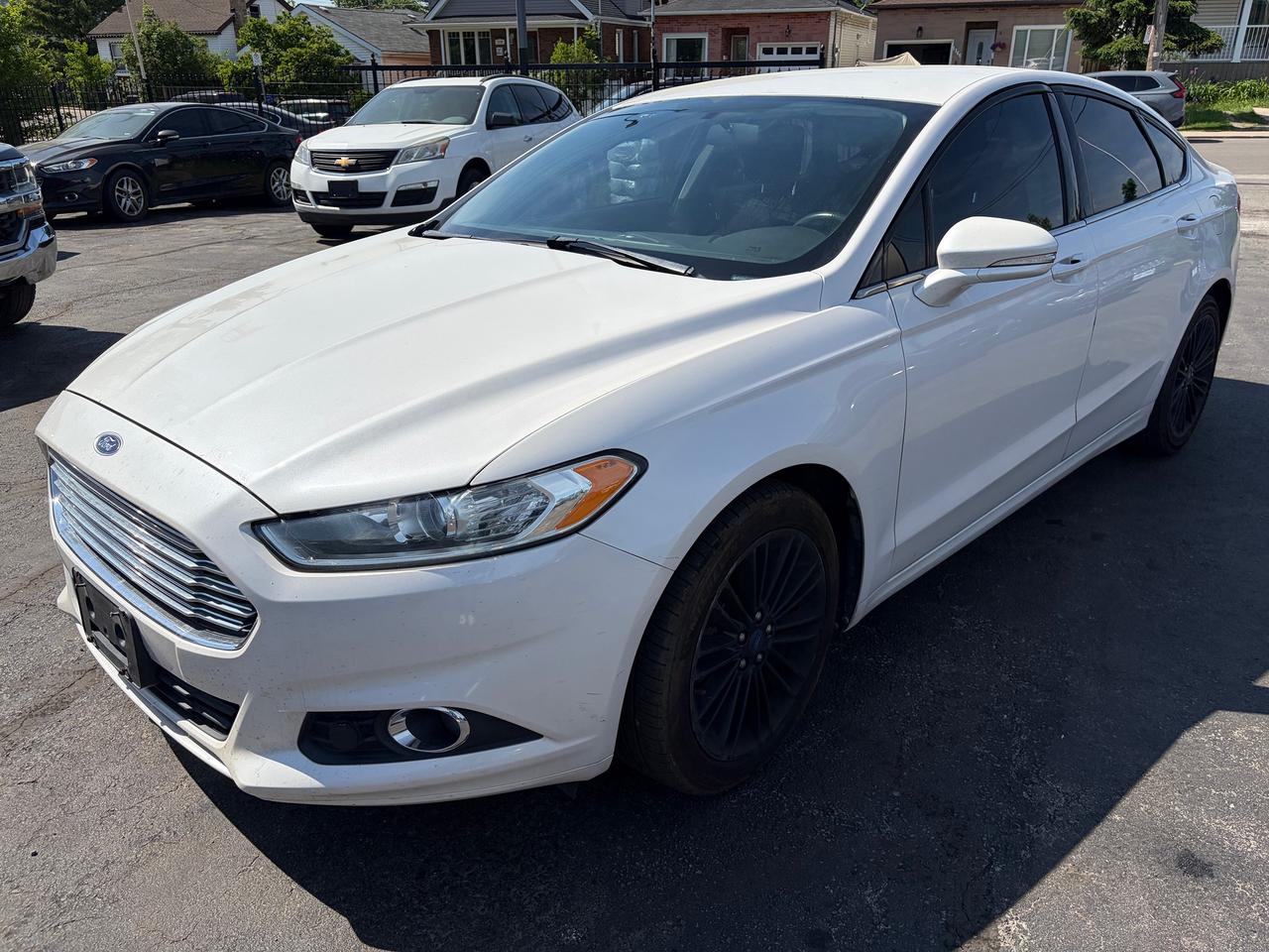 <p data-start=0 data-end=49>✅ Certified | 2013 Ford Fusion SE FWD | Automatic</p><p data-start=51 data-end=339>This Certified 2013 Ford Fusion SE is a stylish and fuel-efficient sedan that offers modern comfort, smooth performance, and excellent value. With its sleek design, spacious interior, and dependable reliability, this Fusion is perfect for commuting, daily driving, and long highway trips.</p><p data-start=341 data-end=809>🔹 2.5L 4-Cylinder Engine<br data-start=366 data-end=369>🔹 Automatic Transmission<br data-start=394 data-end=397>🔹 Front-Wheel Drive (FWD)<br data-start=423 data-end=426>🔹 Heated Front Seats<br data-start=447 data-end=450>🔹 Bluetooth &ndash; Hands-Free Calling & Audio Streaming<br data-start=501 data-end=504>🔹 Backup Camera<br data-start=520 data-end=523 data-is-only-node=>🔹 Power Driver Seat<br data-start=543 data-end=546>🔹 Cruise Control<br data-start=563 data-end=566>🔹 Steering Wheel Audio & Cruise Controls<br data-start=607 data-end=610>🔹 Air Conditioning<br data-start=629 data-end=632>🔹 Power Windows, Locks & Mirrors<br data-start=665 data-end=668>🔹 Keyless Entry<br data-start=684 data-end=687>🔹 Alloy Wheels<br data-start=702 data-end=705>🔹 Traction Control & ABS<br data-start=730 data-end=733>🔹 Spacious, Comfortable & Excellent on Gas<br data-start=776 data-end=779>🔹 Runs and Drives Excellent</p><p data-start=811 data-end=871>📍 Visit Us:<br data-start=823 data-end=826>74 Parkdale Avenue North, Hamilton, Ontario</p><p data-start=873 data-end=925>📞 Call or Text:<br data-start=889 data-end=892>(905) 975-9705 / (905) 462-5542</p><p data-start=927 data-end=960>📧 Email:<br data-start=936 data-end=939><a class=decorated-link cursor-pointer rel=noopener data-start=939 data-end=958>gusmarkos@gmail.com</a></p><p data-start=962 data-end=1018>🗓️ Test Drives by Appointment Only &mdash; Book Yours Today</p><p data-start=1020 data-end=1277>🛡️ Buy With Confidence &mdash; OMVIC Licensed Dealership<br data-start=1071 data-end=1074>✔️ CARFAX VERIFIED &mdash; Full History & Lien-Free<br data-start=1119 data-end=1122>✔️ No Hidden Fees &mdash; Just Price + HST + Licensing<br data-start=1170 data-end=1173>✔️ Trade-Ins Welcome &mdash; Top Dollar for Your Vehicle<br data-start=1223 data-end=1226>✔️ Don&rsquo;t See What You Want? We&rsquo;ll Find It for You</p><p data-start=1279 data-end=1423 data-is-last-node= data-is-only-node=>💻 100% Online Purchase Available &mdash; Financing & Delivery Options<br data-start=1343 data-end=1346>🚗 Ontario-Wide Delivery Available<br data-start=1380 data-end=1383>✈️ Ask About Our Customer Travel Program</p>
