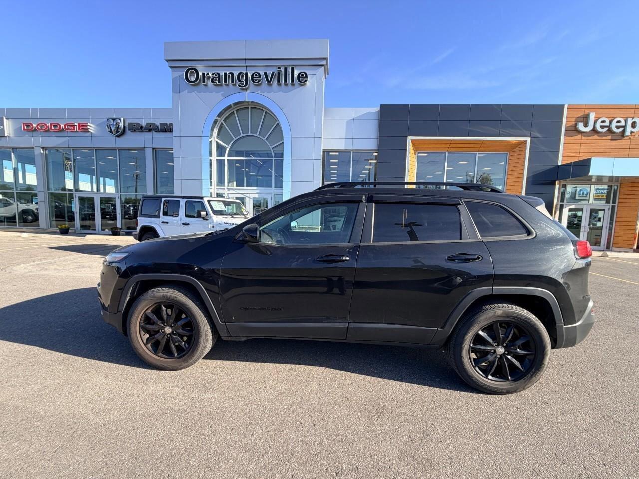 2014 Jeep Cherokee 4WD 4dr North Photo