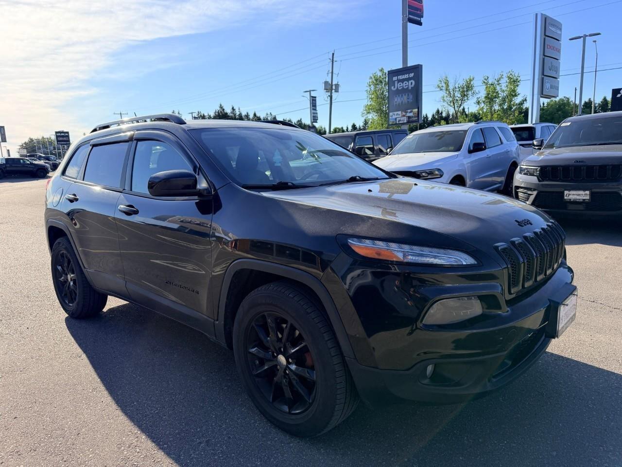 2014 Jeep Cherokee 4WD 4dr North Photo