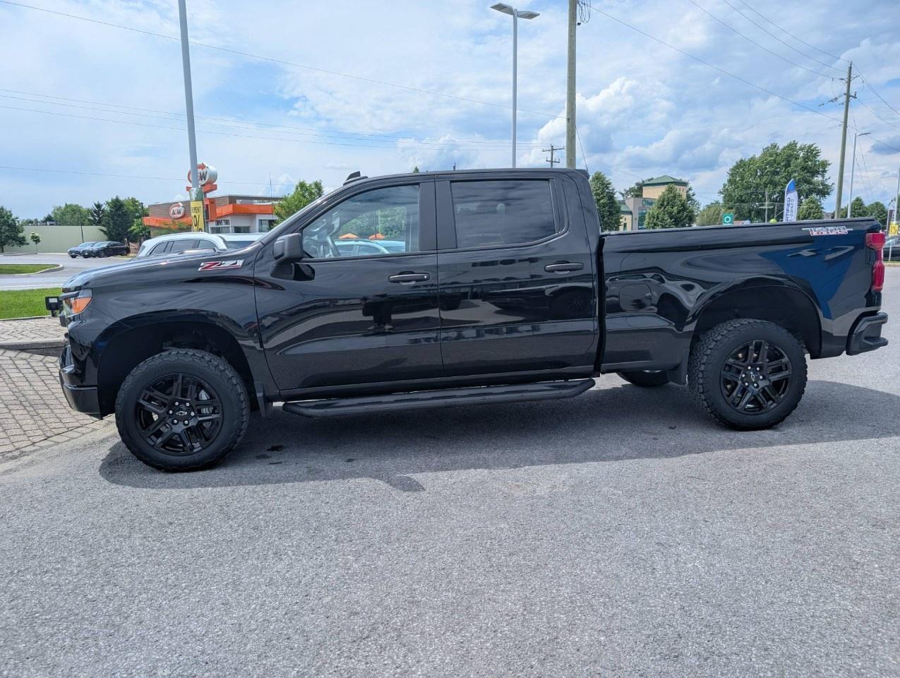 2024 Chevrolet Silverado 1500 Crew Cab Standard Box 4-Wheel Drive Custom Trail Boss Photo