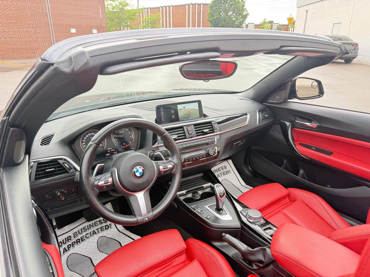 2021 BMW 2-Series 230i   XDRIVE   CONVERTIBLE   M PACKAGE   RED INTE Photo