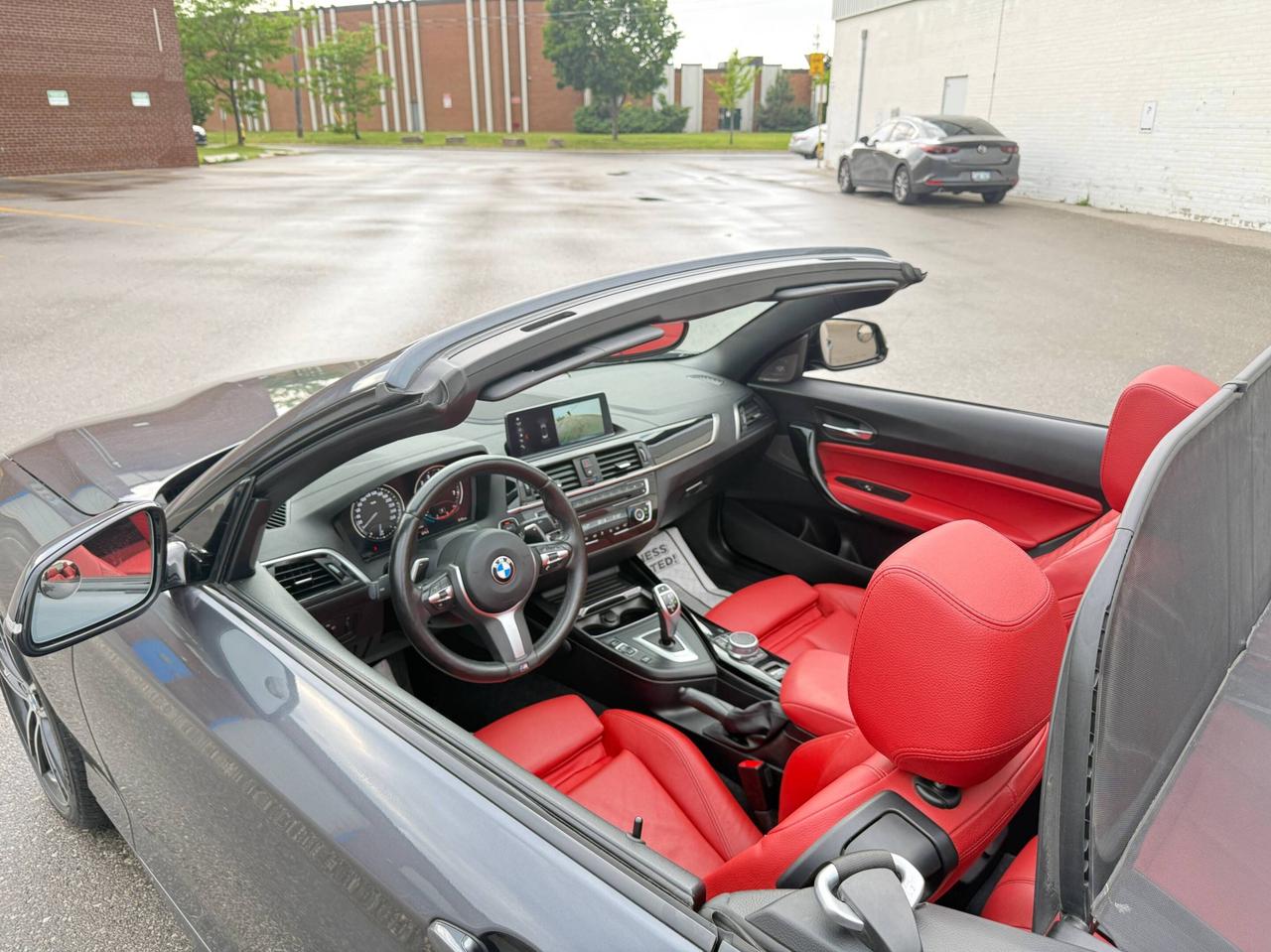 2021 BMW 2-Series 230i   XDRIVE   CONVERTIBLE   M PACKAGE   RED INTE Photo
