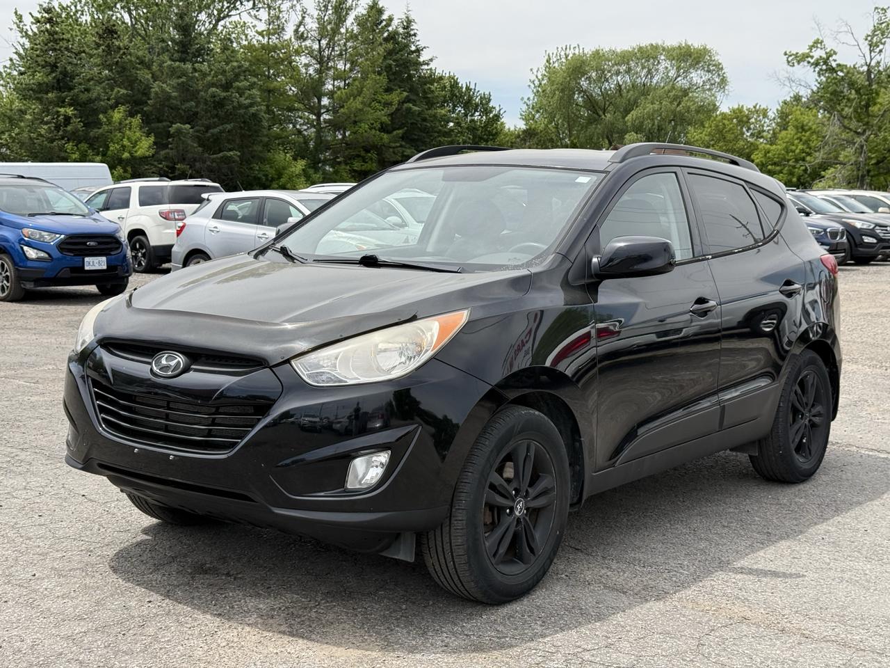 2011 Hyundai Tucson AWD 4dr I4 Auto GLS Photo