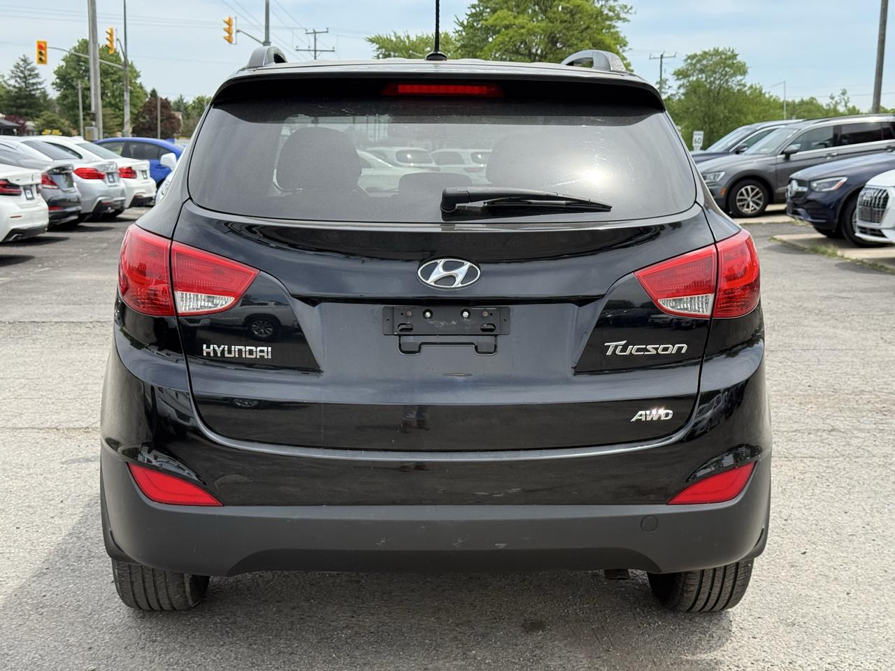 2011 Hyundai Tucson AWD 4dr I4 Auto GLS Photo