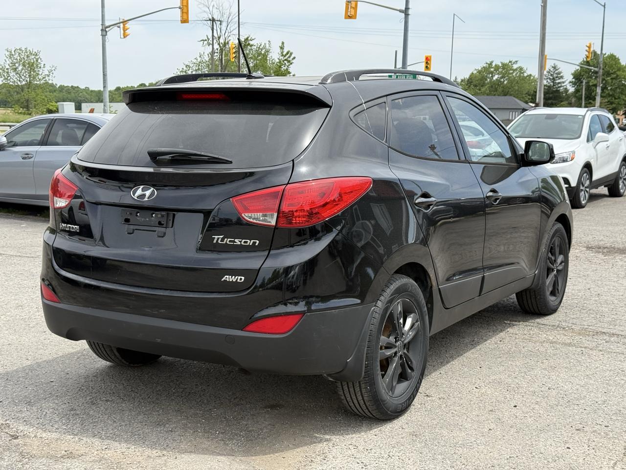 2011 Hyundai Tucson AWD 4dr I4 Auto GLS Photo