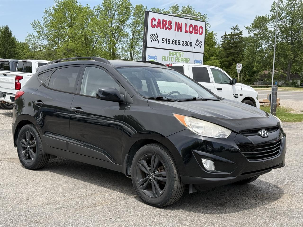 2011 Hyundai Tucson AWD 4dr I4 Auto GLS Photo0