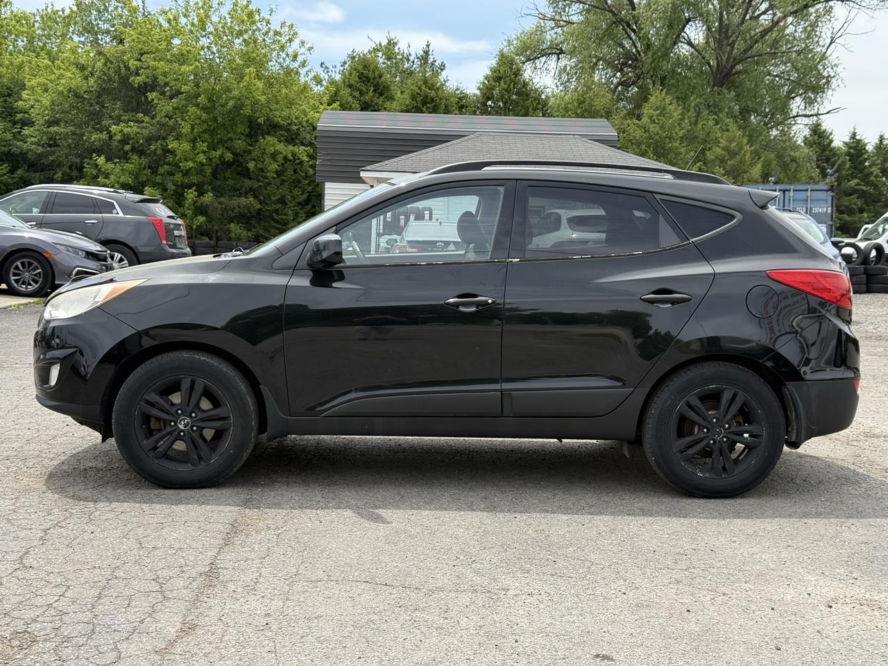 2011 Hyundai Tucson AWD 4dr I4 Auto GLS Photo