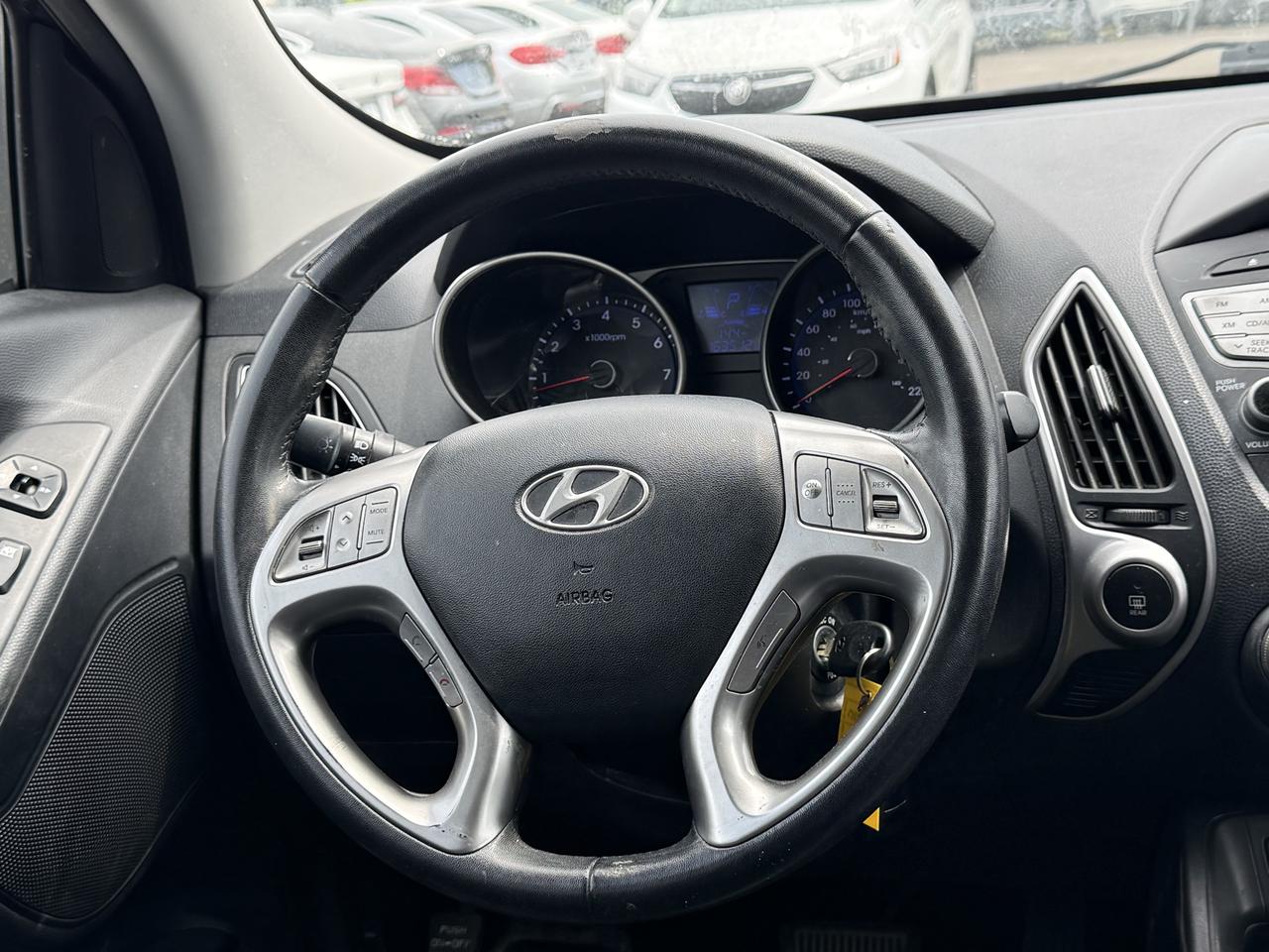 2011 Hyundai Tucson AWD 4dr I4 Auto GLS Photo