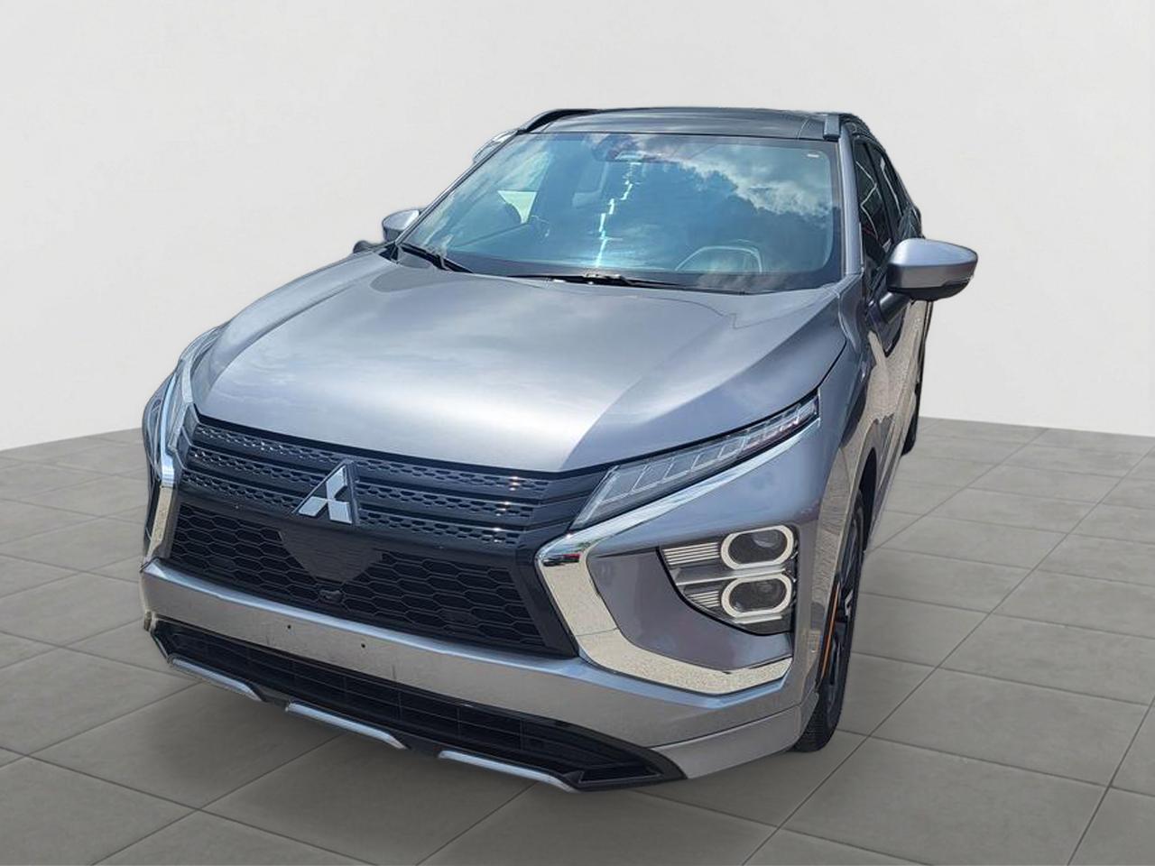 <p>Looking for a stylish and practical SUV that wont break the bank? Barrie Mitsubishi has the perfect solution with this pre-owned 2023 Mitsubishi Eclipse LE. This crossover blends the agile handling and fuel efficiency you expect from a smaller car with the added versatility and commanding view of an SUV. Its the ideal choice for navigating city streets, embarking on weekend getaways, or simply making everyday errands more enjoyable.</p><p>Step inside and discover a comfortable and well-appointed cabin designed with your needs in mind. The <strong>2023 Eclipse LE</strong> offers ample space for passengers and cargo, making it incredibly versatile for families, commuters, and adventurers alike. Its modern design and thoughtful features ensure a pleasant driving experience every time you get behind the wheel. Come on down to Barrie Mitsubishi and see how this 2023 Mitsubishi Eclipse LE can elevate your daily drive.</p><p>Here are 5 features that make this 2023 Mitsubishi Eclipse LE a true standout:</p><ul><li><strong>Versatile SUV/Crossover Design:</strong> Enjoy the best of both worlds with a nimble ride and elevated driving position, perfect for any Canadian road.</li><li><strong>Modern and Sleek Styling:</strong> Turn heads with a contemporary design thats both sporty and sophisticated, making a statement wherever you go.</li><li><strong>Practical and Spacious Interior:</strong> With ample room for both passengers and your gear, this crossover is ready for all of lifes adventures.</li><li><strong>Agile and Efficient Performance:</strong> Experience a drive thats both engaging and economical, making it a smart choice for your daily commute and beyond.</li><li><strong>Feature-Rich LE Trim:</strong> This trim level is packed with thoughtful amenities designed to enhance your comfort and convenience on every journey.</li></ul><p><strong><em>Powered by AutoIntelligence&trade;</em></strong></p><p>Vehicle information has been generated using artificial intelligence and is provided for informational purposes only. While efforts are made to ensure accuracy, please confirm all details directly with the dealer.</p>