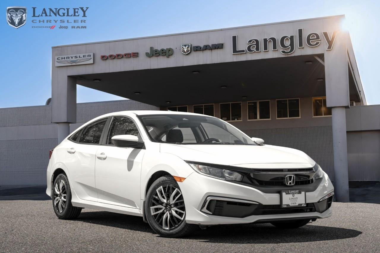 <p><strong>2020 Honda Civic Sedan LX CVT</strong></p><p>The 2020 Honda Civic LX Sedan is a practical and reliable compact car, valued for its fuel efficiency, spacious interior, and comprehensive standard safety technology.</p><ul><li><p><strong>Engine:</strong> 2.0L 4-cylinder (158 hp, 138 lb-ft torque)</p></li><li><p><strong>Drivetrain:</strong> Front-Wheel Drive (FWD) with Continuously Variable Transmission (CVT)</p></li><li><p><strong>Safety:</strong> Honda Sensing® suite (includes Collision Mitigation Braking, Road Departure Mitigation, Lane Keeping Assist, and Adaptive Cruise Control)</p></li><li><p><strong>Infotainment:</strong> 5-inch color LCD screen with Bluetooth® HandsFreeLink® and streaming audio</p></li><li><p><strong>Fuel Economy:</strong> Approximately 7.9 L/100km city / 6.1 L/100km highway</p></li></ul><p>Come book a test drive at Langley Chrysler, conveniently located in Langley, British Columbia.</p>

<p>*All prices plus applicable taxes, applicable environmental recovery charges, documentation of $599 and full tank of fuel surcharge of $76 if a full tank is chosen. <br />Other protection items available that are not included in the above price:<br />Tire & Rim Protection and Key fob insurance starting from $599<br />Service contracts (extended warranties) for coverage up to 7 years and 200,000 kms starting from $599<br />Custom vehicle accessory packages, mudflaps and deflectors, tire and rim packages, lift kits, exhaust kits and tonneau covers, canopies and much more that can be added to your payment at time of purchase<br />Undercoating, rust modules, and full protection packages starting from $199<br />Financing Fee of $500 when applicable<br />Flexible life, disability and critical illness insurances to protect portions of or the entire length of vehicle loan</p>