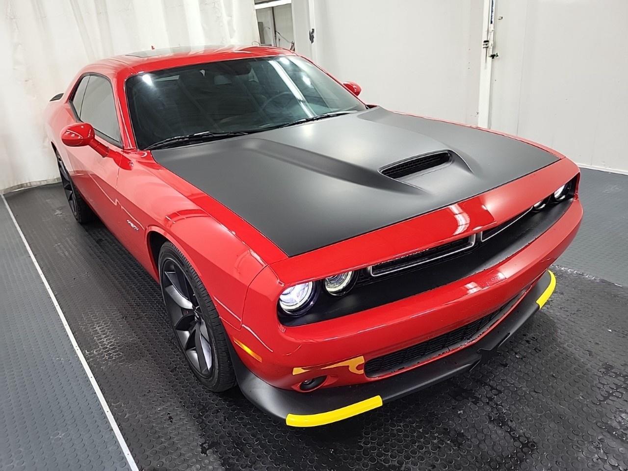Recent Arrival! 2021 Dodge Challenger R/T HEMI 5.7L V8 VVT | RT | Low Kms | Zacks Certified. 8-Speed Automatic RWD Torred Clearcoat HEMI 5.7L V8 VVT<br /><br /><br />1-Year SiriusXM Subscription, 230MM Rear Axle, 276-Watt Amplifier, 8.4''' Touchscreen, Air Conditioning, Alloy wheels, Apple CarPlay Capable, Apple CarPlay/Android Auto, Automatic High Beam Headlamp Control, Automatic temperature control, Black Brake Calipers, Blind-Spot/Rear Cross-Path Detection, Body-Coloured Power Multi-Function Mirrors, Brembo Fixed Caliper 4-Piston Brakes, Carbon Fibre Interior Accents, Carbon/Suede Interior Package, Door Trim Panels w/Ambient Lighting, Driver Convenience Group, Front fog lights, Front Ventilated Seats, harman/kardon 18-Speaker Audio System, harman/kardon GreenEdge Amp, harman/kardon Sound Group, HD Radio, Heated door mirrors, Heated Steering Wheel, High Performance Suspension, High-Intensity Discharge Headlamps, Leather Flat-Bottom Steering Wheel, Leather Shift Knob, Leather/Alcantara Faced Front Vented, Line Lock Launch Control, Performance Handling Group, Performance Steering, Plus Group, Power driver seat, Power Sunroof, Power Tilt/Telescoping Steering Column, Premium-Stitched Dash Panel, Quick Order Package 28H, Radio: Uconnect 4C w/8.4''' Display, Rain sensing wipers, Red Brake Calipers, Remote keyless entry, Remote Start System, Rhombi Illum Air Catcher Headlamp, Shark Fin Antenna, SiriusXM Satellite Radio, Speed control, Spoiler, Suede Headliner, Surround Sound, Technology Group, Tilt steering wheel, Trunk-Mounted Subwoofer, Wheels: 20''' x 9''' Lights Out Painted.<br /><br />Certification Program Details: Fresh 2 Yr MVI | 30 day warranty* | 110 point inspection | Full tank of fuel | Krown rustproofed | Flexible financing options | Professionally detailed<br /><br />This vehicle is Zacks Certified! You're approved! We work with you. Together we'll find a solution that makes sense for your individual situation. Please visit us or call 902 843-3900 to learn about our great selection.<br /><br />With 22 lenders available Zack's Auto Sales can offer our customers with the lowest available interest rate. Thank you for taking the time to check out our selection!