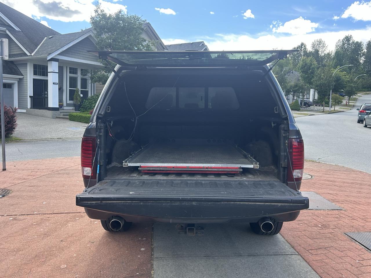 2014 RAM 1500 4WD CREW CAB 149" SPORT Photo