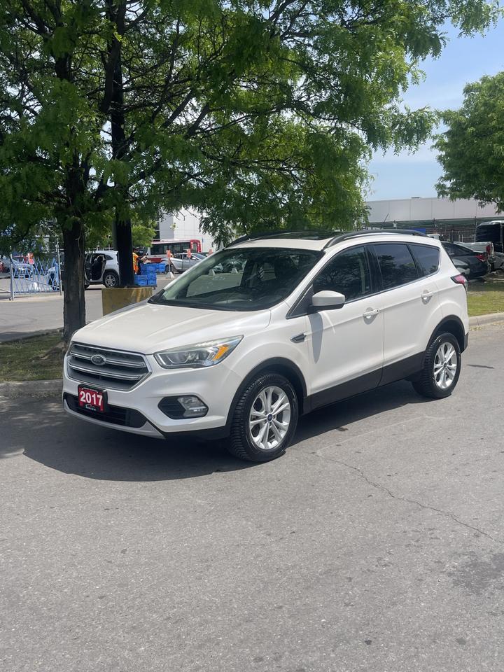 <p>WOW!!CHECK OUT THIS FORD ESCAPE SE FINISHED IN GORGEOUS WHITE PLATINUM METALLIC!!1.5L ECOBOOST!!AUTOMATIC WITH PADDLE SHIFTERS!!4 WHEEL DRIVE!!ONLY 173,000 KMS!!TILT AND CRUISE CONTROL!!POWER WINDOWS AND LOCKS!!POWER HEATED LEATHER INTERIOR!!ICE COLD AIR CONDITION!!NAVIGATION!!REVERSE CAMERA!!ALLOYS!!NO ACCIDENTS, CARFAX INCLUDED!!VERY CLEAN IN AND OUT!!MUST BE SEEN AND TEST DRIVEN!!AUTOGARD ADVANTAGE WARRANTIES AVAILABLE!!FULLY CERTIFIED FOR ONLY $ 8,999 + HST AND LICENSING</p><p>&nbsp;</p><p style=text-align: center;>PLEASE CALL OR TEXT 416 822-5204!!</p><p style=text-align: center;>WE FINANCE!! GOOD, BAD, NO CREDIT!!&nbsp;</p><p style=text-align: center;>EXTENDED WARRANTIES AVAILABLE ON ALL VEHICLES!!</p>