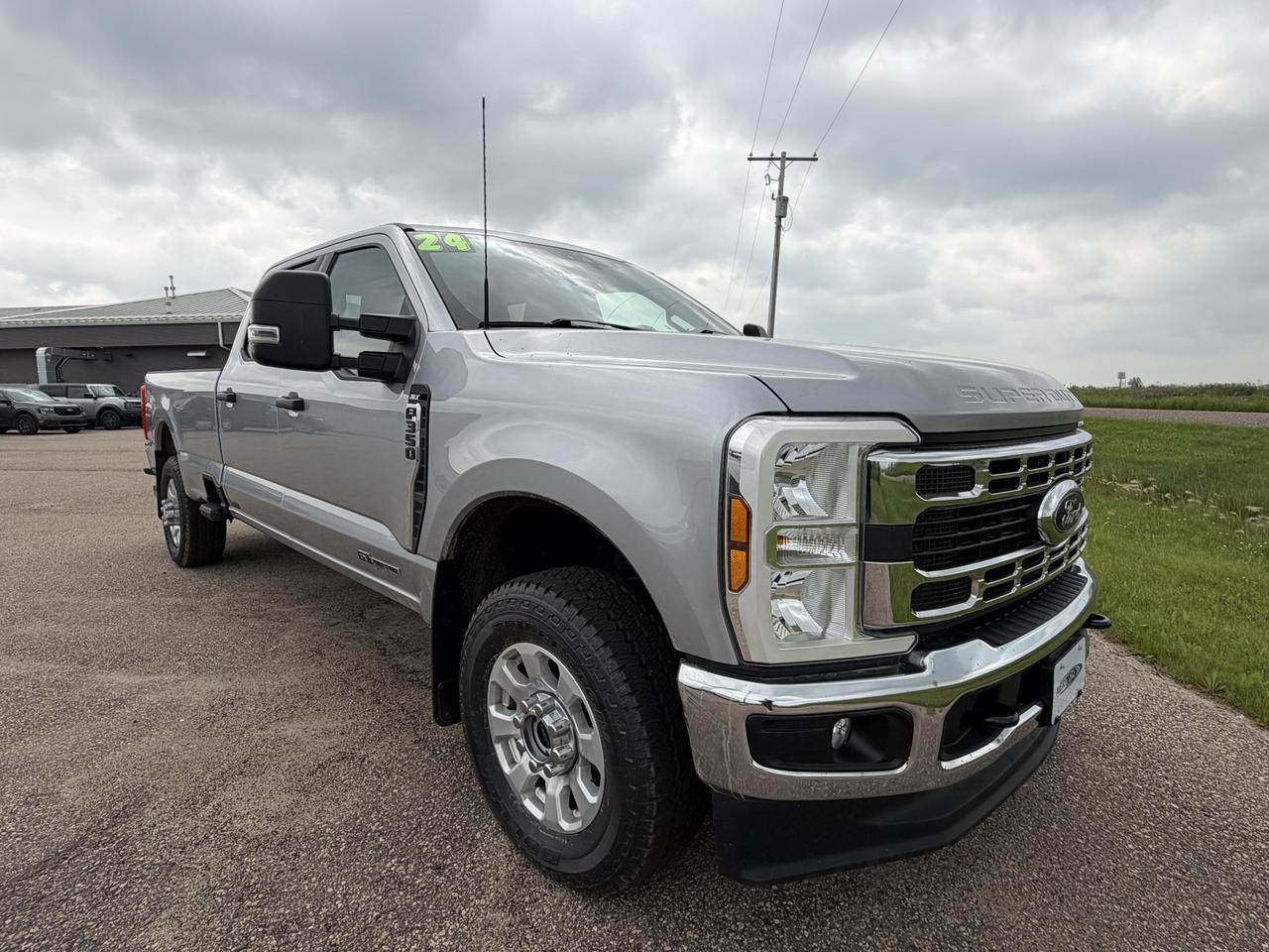 If you need a truck that means business, this 2024 Ford Super Duty F-350 XLT with the legendary 6.7L Power Stroke V8 Diesel delivers the capability and durability serious work demands. Specd out with the 613A+ package and sitting on 4WD, this Crew Cab Long Bed in Iconic Silver Metallic is built for those who need maximum payload, towing confidence, and long-haul reliability  all in a well-equipped, comfortable package.

- 6.7L Power Stroke V8 Diesel engine  purpose-built for heavy towing and demanding workloads
- 613A+ trim package, adding premium features above the standard XLT spec
- Crew Cab Long Bed configuration  room for your crew and your gear
- Part-Time 4WD with 4-Wheel Disc Brakes, ABS, Brake Assist, and Hill Hold Control for confident handling on and off the job site
- FordPass Connect 5G Mobile Hotspot  stay connected wherever the work takes you
- Comprehensive airbag system including seat-mounted side, front, and Safety Canopy curtain airbags for first and second rows
- Securilock Anti-Theft Ignition Immobilizer for peace of mind when equipment is on the line
- Automatic transmission and Hydraulic Power-Assist Steering for smooth, controlled operation under load
- 85,000 km  still plenty of working life ahead at a fraction of new pricing

Ready to put this F-350 to work for you? Contact Merit Ford Sales today with any questions, book an appointment for a test drive, or get started on your purchase online. Our team is here to make the process straightforward and efficient  just like the truck itself.