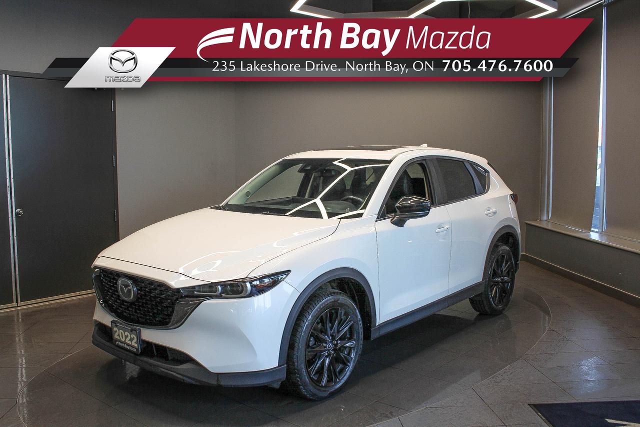 The 2022 Mazda CX-5 Kuro adds a bold look to one of Mazdas most popular SUVs, blending everyday practicality with a more distinctive sense of style. FEATURES: Leather seats, heated front seats, heated steering wheel, power drivers seat with memory settings, power moonroof, Apple CarPlay and Android Auto, dual-zone automatic climate control, power liftgate, backup camera, blind spot monitoring, rear cross traffic alert, adaptive cruise control, lane keep assist, advanced keyless entry, push-button start, rain-sensing wipers.

Why Youll Want to Buy from North Bay Mazda? *The Clubhouse Commitment Pre-Owned Vehicle Program provides you with additional coverage for things such as the 3-year Tire and Rim Coverage, The Clubhouse Powertrain Warranty, coverage for The Little Things like battery, wiper, and bulb replacement, 3- year anti-theft protection to give you the ultimate peace of mind when purchasing a pre-owned vehicle. Clubhouse Commitment is an optional coverage which 
can be purchased at time of sale for a $699 value. Pre-Owned Vehicle purchases are subject to 
an adjusted price when purchasing with cash. You are eligible for Finance Pricing with a maximum down payment of 15% of listed finance price. Contact us for more details. * Our certified vehicles go through a 120-point Clubhouse Certified Used Vehicle Inspection, and we will provide the CarFax vehicle history documents as well as any available service history. * We competitively price our vehicles below the market average which means that we have already done all the market research for you. Rest assured that you are getting the best deal possible. * We have automotive financial experts who are experienced in dealing with all levels of credit challenges. We also work with all major banks and third-party lenders daily so we are confident that we can get you the best rate available. * As a premier New and Pre-Owned vehicle 
dealership, we pride ourselves on a superior customer experience and a lifetime of customer care. We are conveniently located at 235 Lakeshore Drive, in North Bay, Ontario. If you cant make it to us, we can accommodate you! Call us today at 705-476-7600 to come in and see this vehicle!