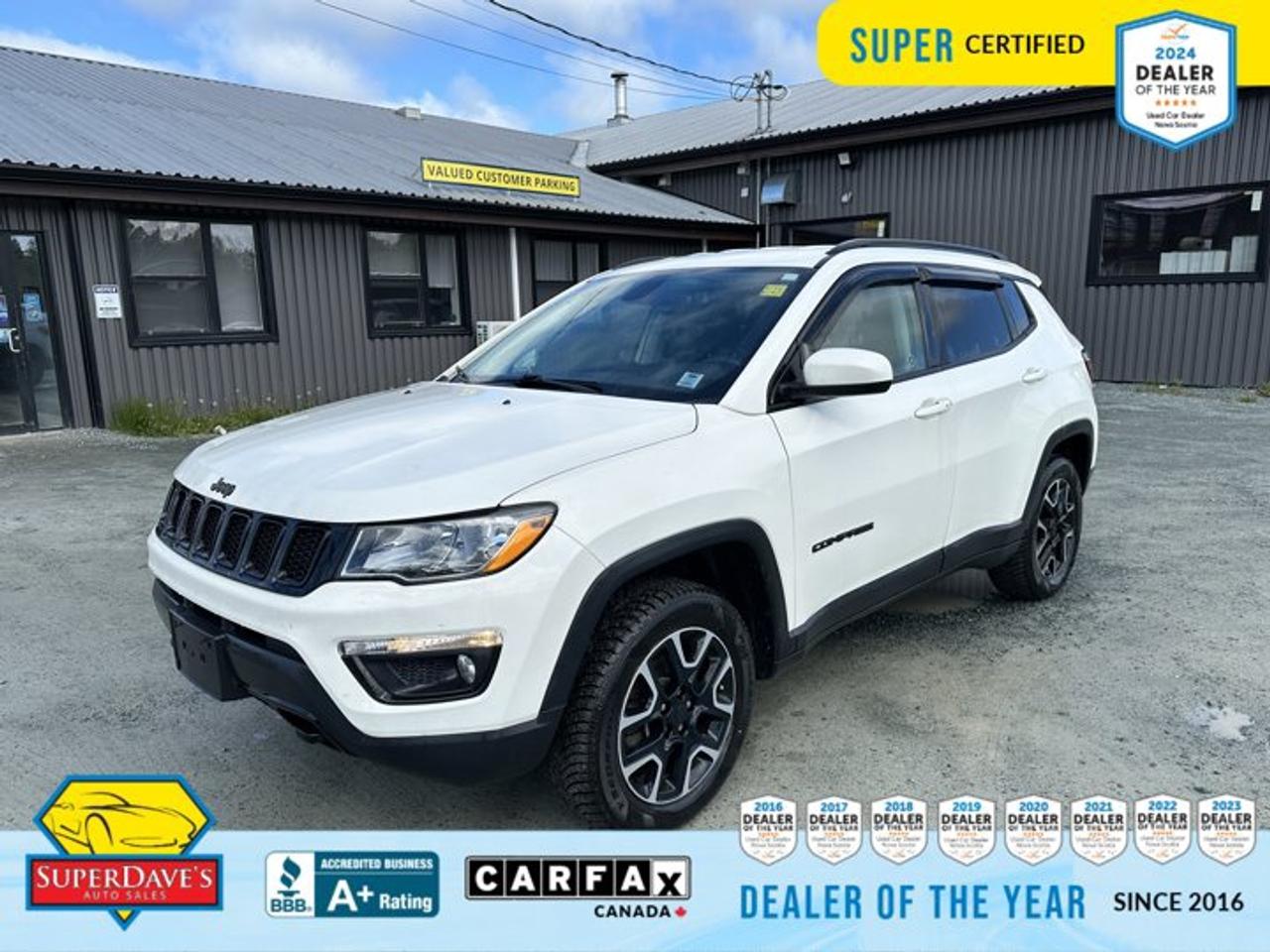<p> WHITE, COMPACT SPARE TIRE, BLACK, CLOTH BUCKET SEATS, Wireless Phone Connectivity, Wheels: 17 x 6.5 Diamond Cut Aluminum, Vinyl Door Trim Insert, Variable Intermittent Wipers, USB Mobile Projection, Transmission w/Driver Selectable Mode, Tires: 225/60R17 BSW AS. This Jeep Compass has a strong Regular Unleaded I-4 2.4 L/144 engine powering this Automatic transmission. </p> <p>These Packages Will Make Your Jeep Compass UPLAND EDITION The Envy of Your Friends <br /> Tire Mobility Kit, Stainless Steel Exhaust, Smart Device Integration, Sliding Front Centre Armrest w/Storage and Rear Centre Armrest, Side Impact Beams, Selec-Terrain ABS And Driveline Traction Control, Remote Keyless Entry w/Integrated Key Transmitter, Illuminated Entry, Illuminated Ignition Switch and Panic Button, Reflector Halogen Daytime Running Headlamps, Rear Child Safety Locks, Radio: Uconnect 4 w/7 Display, Radio w/Seek-Scan, Clock, Aux Audio Input Jack and Steering Wheel Controls, Power Heated Side Mirrors w/Manual Folding, Power 1st Row Windows w/Driver And Passenger 1-Touch Up/Down, ParkView Back-Up Camera, Outboard Front Lap And Shoulder Safety Belts -inc: Rear Centre 3 Point, Height Adjusters and Pretensioners, Media Hub w/USB & Aux Input Jack, Manual Tailgate/Rear Door Lock, Low Tire Pressure Warning, Interior Trim -inc: Chrome Instrument Panel Insert, Instrument Panel Bin, Driver / Passenger And Rear Door Bins. </p><br><p>THE SUPER DAVES ADVANTAGE</p> <p>BUY REMOTE - No need to visit the dealership. Through email, text, or a phone call, you can complete the purchase of your next vehicle all without leaving your house!</p> <p>DELIVERED TO YOUR DOOR - Your new car, delivered straight to your door! When buying your car with Super Daves, well arrange a fast and secure delivery. Just pick a time that works for you and well bring you your new wheels!</p> <p>PEACE OF MIND WARRANTY - Every vehicle we sell comes backed with a warranty so you can drive with confidence.</p> <p>EXTENDED COVERAGE - Get added protection on your new car and drive confidently with our selection of competitively priced extended warranties.</p> <p>WE ACCEPT TRADES - We&rsquo;ll accept your trade for top dollar! We&rsquo;ll assess your trade in with a few quick questions and offer a guaranteed value for your ride. We&rsquo;ll even come pick up your trade when we deliver your new car.</p> <p>SUPER CERTIFIED INSPECTION - Every vehicle undergoes an extensive 120 point inspection, that ensure you get a safe, high quality used vehicle every time.</p> <p>FREE CARFAX VEHICLE HISTORY REPORT - If youre buying used, its important to know your cars history. Thats why we provide a free vehicle history report that lists any accidents, prior defects, and other important information that may be useful to you in your decision.</p> <p>METICULOUSLY DETAILED &ndash; Buying used doesn&rsquo;t mean buying grubby. We want your car to shine and sparkle when it arrives to you. Our professional team of detailers will have your new-to-you ride looking new car fresh.</p> <p>(Please note that we make all attempt to verify equipment, trim levels, options, accessories, kilometers and price listed in our ads however we make no guarantees regarding the accuracy of these ads online. Features are populated by VIN decoder from manufacturers original specifications. Some equipment such as wheels and wheels sizes, along with other equipment or features may have changed or may not be present. We do not guarantee a vehicle manual, manuals can be typically found online in the rare event the vehicle does not have one. Please verify all listed information with our dealership in person before purchase. The sale price does not include any ongoing subscription based services such as Satellite Radio. Any software or hardware updates needed to run any of these systems would also be the responsibility of the client. All listed payments are OAC which means On Approved Credit and are estimated without taxes and fees as these may vary from deal to deal, taxes and fees are extra. As these payments are based off our lenders best offering they may be subject to change without notice. Please ensure this vehicle is ready to be viewed at the dealership by making an appointment with our sales staff. We cannot guarantee this vehicle will be on premises and ready for viewing unless and appointment has been made.)</p>