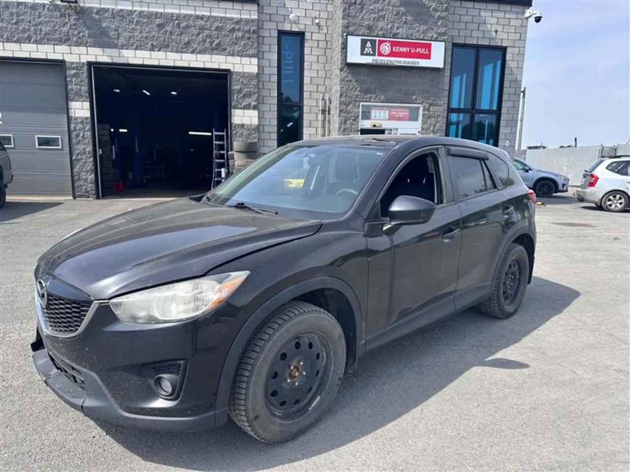 À vendre chez Kenny Drummondville : Mazda CX-5 Touring AWD 2013, prêt pour laventure! Ce VUS très propre vous offre un moteur 2.0L L4 DOHC 16V fiable et économique, parfait pour la conduite en ville comme sur la route. Profitez de la traction intégrale pour une sécurité accrue en toutes saisons, de sièges chauffants, dun système audio de qualité, de la climatisation, du régulateur de vitesse et de jantes en alliage pour un look moderne. Vendu tel quel : économisez sur le prix dachat . Ne manquez pas cette occasion de conduire un VUS spacieux, confortable et bien équipé à petit prix. Passez le voir dès aujourdhui!
