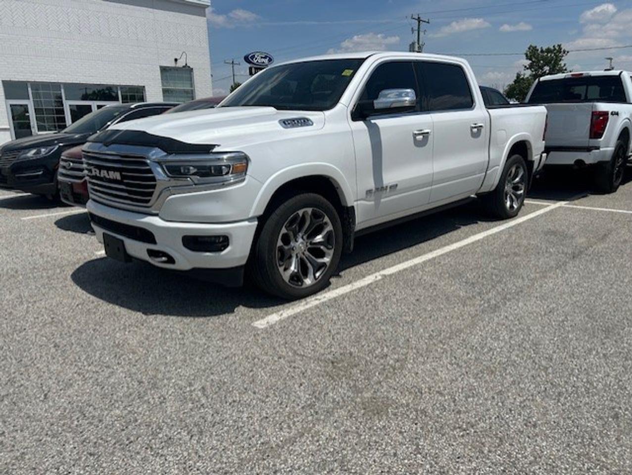 Built to handle hard work and long highway days, this used 2020 RAM 1500 Longhorn brings premium truck comfort and proven capability together in one refined package. Finished in White with an automatic transmission, it has had a single owner, as reported by CARFAX Canada, giving added peace of mind for your next purchase at Watford Ford in Watford.

The 2020 RAM 1500 Longhorn is known for its upscale design, smooth ride, and strong towing confidence. It stands out with a well-finished cabin, advanced engineering, and the kind of everyday usability truck buyers want. If you need a pickup that feels ready for both the jobsite and weekend travel, this RAM 1500 Longhorn deserves a close look.

FEATURES OF THE 1500 Longhorn
»» Premium western-inspired Longhorn design details
»» Refined cabin with upscale finishing touches
»» Smooth ride from advanced frame engineering
»» Full-size capability with luxury-focused character

TRUCK FEATURES
»» Strong towing capability when properly equipped
»» Durable pickup box for daily utility
»» Four-door cab adds passenger flexibility
»» Built for work and long trips

ADVANCED SAFETY FEATURES
»» Rearview camera supports easier reversing
»» Advanced airbag system for added protection
»» Electronic stability control helps maintain grip
»» Trailer sway control supports steadier towing

PERFORMANCE AND EFFICIENCY
»» Automatic transmission delivers smooth daily driving
»» Strong truck performance for varied tasks
»» Well-tuned suspension improves ride comfort
»» Highway manners feel composed and quiet

COMFORT AND CONVENIENCE
»» Spacious cabin for passengers and gear
»» Dual-zone climate control adds comfort
»» Crew-friendly layout supports daily practicality
»» Easy entry for work or travel

TECHNOLOGY AND CONNECTIVITY
»» Large touchscreen interface on many models
»» Bluetooth connectivity supports hands-free calling
»» Clear driver information display layout
»» USB ports support device charging

CARGO SPACE
»» Pickup bed handles bulky cargo easily
»» Rear cabin storage adds useful flexibility
»» Wide box opening helps loading tasks
»» Cabin offers practical small-item storage

AWARDS & RECOGNITIONS
»» 2020 Truck of Texas, Texas Auto Writers Association
»» Luxury Pickup Truck of Texas, 2020

WHAT OTHER OWNERS LIKE
»» Smooth ride for a full-size truck
»» Quiet cabin during highway travel
»» Strong towing confidence and stability
»» Premium interior feel and comfort

At Watford Ford, this used 2020 RAM 1500 Longhorn offers a rare mix of pickup strength and near-luxury comfort. Its White exterior gives it a clean, confident look, while the automatic transmission helps make every drive easy in town or on the open road. For drivers who want a capable truck without giving up refinement, this one checks the right boxes.

This 2020 RAM 1500 Longhorns VIN is: 1C6SRFKT7LN353410.

OMVIC Mandatory AS Is Disclosure

This vehicle is being sold as is, unfit, not e-tested and is not represented as being in roadworthy condition, mechanically sound or maintained at any guaranteed level of quality.
The vehicle may not be fit for use as a means of transportation and may require substantial repairs at the purchasers expense.
It may not be possible to register the vehicle to be driven in its current condition.