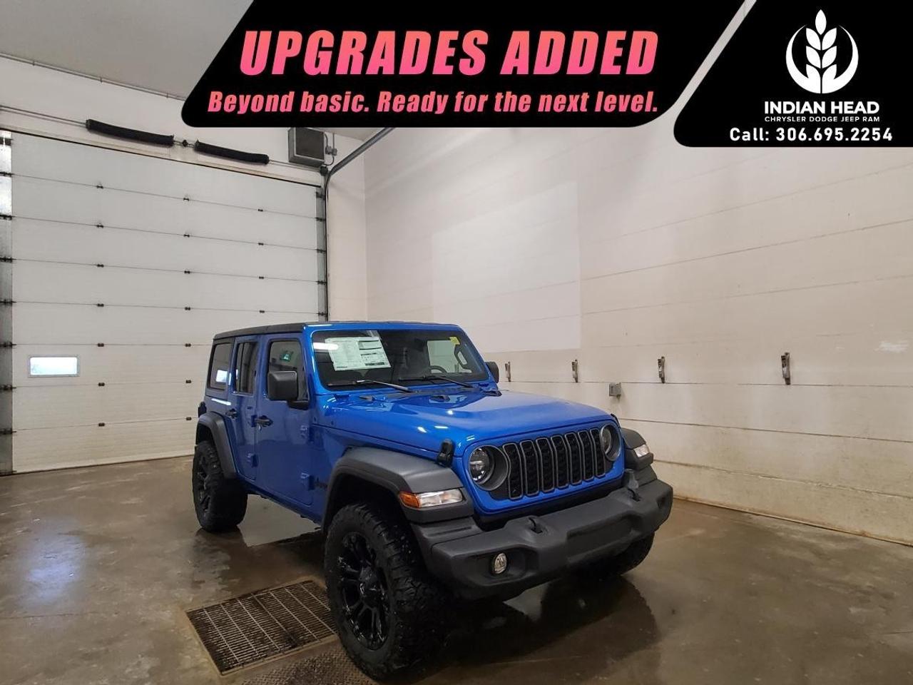 <p>Meet the 2025 Jeep Wrangler Sport S 4x4 in a striking blue finish, equipped with a robust 4×4 drivetrain that guarantees exceptional handling and off-road capability. Known for its rugged style and adventurous spirit, the Wrangler promises both exciting journeys and smooth urban drives.</p><p>This SUV's bold exterior is complemented by power heated mirrors and sleek alloy wheels, making it as functional as it is eye-catching. Inside, the blue interior adds a touch of elegance, while practical features like air conditioning, sun visors with illuminated vanity mirrors, and a premium-wrapped steering wheel ensure comfort on every drive.</p><p>Equipped with cutting-edge technology, the 2025 Wrangler Sport S includes smart device integration and a Wi-Fi hotspot, ensuring you're always connected on the go. Safety is enhanced with features such as a backup camera, advanced brake assist, full-speed forward collision warning plus, and enhanced adaptive cruise control, providing confidence and peace of mind on every adventure.</p><p>Whether you're an outdoor enthusiast or looking for a reliable SUV for family trips, the Jeep Wrangler Sport S is tailored to meet your needs. Don't miss out on experiencing this impressive vehicle firsthand. Contact us today to schedule a test drive and learn more!</p>
