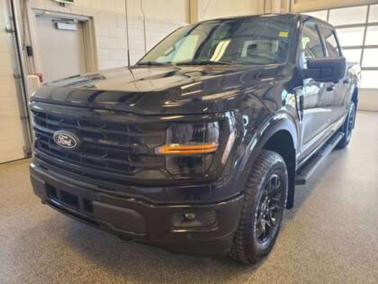 The all-new 2026 Ford F-150 XLT 302A is a statement of style in Agate Black Metallic. Powered by the 5.0L V8 engine, it delivers 400 horsepower and 500 lb-ft of torque, paired with a 10-speed automatic transmission. This truck achieves an impressive, combined fuel economy of 11.8 L/100 km (24 miles per gallon).

Key Features:
12 LCD Captivity Touchscreen
Electronic Power-Assist Steering
Dual-Zone Electronic Auto Temp Control
Cruise Control
Power Windows
AdvanceTrac® With Roll Stability Control
Perimeter Alarm
Ford Co-Pilot360
Lane Keeping System
Rear View Camera
Rear Parking Sensors
Reverse Park Assist
Class IV Trailer Hitch
Power Drivers Seat
Remote Start
SYNC®4
Apple Car Play
18 All Terrain Tires
Bluetooth Connectivity
XLT Black Appearance Package
Engine Block Heater
Trailer Brake Controller
Bed Utility Package

Moose Jaw Ford, conveniently located at 1010 North Service Road in Moose Jaw, is your trusted destination for all your automotive needs. With an impressive 4.8-star Google rating from nearly 1,500 reviews, we are proud to deliver an exceptional vehicle-buying experience tailored just for you. Our Moose Jaw Motives set us apart, offering unbeatable value like half-priced oil changes for life on pre-owned vehicles, one year of key and remote protection, and one year of tire and rim protection. Enjoy peace of mind with every purchase. At Moose Jaw Ford, were committed to driving positive change in our community by combining exceptional service, high-quality vehicles, and a guest-first approach. Visit us today!