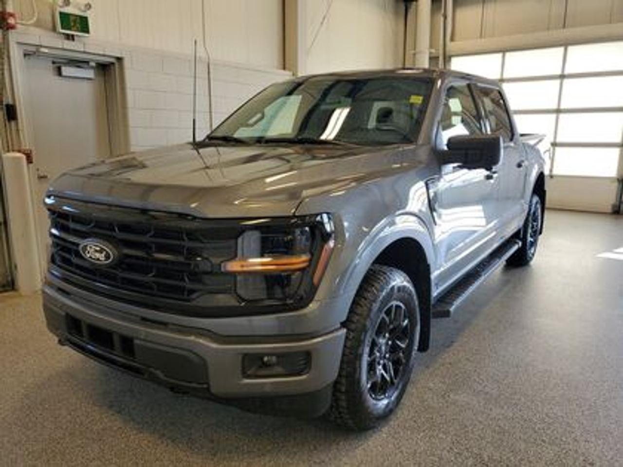 The all-new 2026 Ford F-150 XLT 302A is a statement of style in Carbonized Grey Metallic. Powered by the 5.0L V8 engine, it delivers 400 horsepower and 500 lb-ft of torque, paired with a 10-speed automatic transmission. This truck achieves an impressive, combined fuel economy of 12.3L/100 km (23 miles per gallon).

Key Features:
12 LCD Captivity Touchscreen
Electronic Power-Assist Steering
Dual-Zone Electronic Auto Temp Control
Cruise Control
Power Windows
AdvanceTrac® With Roll Stability Control
Perimeter Alarm
Ford Co-Pilot360
Lane Keeping System
Rear View Camera
Rear Parking Sensors
Reverse Park Assist
Class IV Trailer Hitch
Power Drivers Seat
Remote Start
SYNC®4
Apple Car Play
18 All Terrain Tires
Bluetooth Connectivity
XLT Black Appearance Package
Engine Block Heater
Tow/Haul Package
FX4 Off Road Package
Bed Utility Package

Moose Jaw Ford, conveniently located at 1010 North Service Road in Moose Jaw, is your trusted destination for all your automotive needs. With an impressive 4.8-star Google rating from nearly 1,500 reviews, we are proud to deliver an exceptional vehicle-buying experience tailored just for you. Our Moose Jaw Motives set us apart, offering unbeatable value like half-priced oil changes for life on pre-owned vehicles, one year of key and remote protection, and one year of tire and rim protection. Enjoy peace of mind with every purchase. At Moose Jaw Ford, were committed to driving positive change in our community by combining exceptional service, high-quality vehicles, and a guest-first approach. Visit us today!