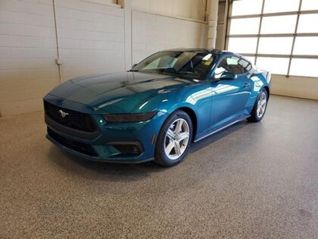 This new 2026 Ford Mustang EcoBoost Premium looks eye catching in the color Adriatic Blue. This fastback comes with the 2.3L EcoBoost engine which connects you to the road with this 10-speed automatic transmission. This popular engine produces 315 horsepower and 350 lb.-ft of torque.  

Key Features:
Ford Co-Pilot 360 Technology 
Lane Keep Assist 
Heated Steering Wheel
Rear View Camera 
Adaptive Cruise Control
Rain Sensing Wipers 
Rear Parking Sensors 
Ford Connectivity Package (1-year included)*
SYNC 4W/ 9 Speaker Stereo System
Wireless Apple Car Play/Android Auto Connection 
Leather Heated Seats
13.2 LCD Touchscreen
Pre- Collison Assist 
3.15 Limited Slip Axle 
18 X 8 Painted Shadow Silver Cast Aluminum 
Dual-Zone Climate Control 
6-Way Power Drivers Seat & 4-Way Power Passenger Seat

Moose Jaw Ford, conveniently located at 1010 North Service Road in Moose Jaw, is your trusted destination for all your automotive needs. With an impressive 4.8-star Google rating from nearly 1,500 reviews, we are proud to deliver an exceptional vehicle-buying experience tailored just for you. Our Moose Jaw Motives set us apart, offering unbeatable value like half-priced oil changes for life on pre-owned vehicles, one year of key and remote protection, and one year of tire and rim protection. Enjoy peace of mind with every purchase. At Moose Jaw Ford, were committed to driving positive change in our community by combining exceptional service, high-quality vehicles, and a guest-first approach. Visit us today!