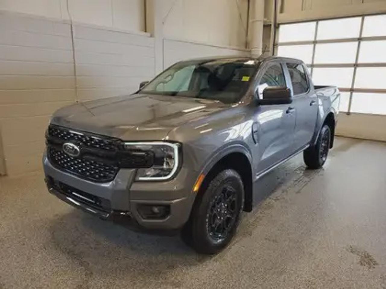 This all-new 2026 Ford Ranger XLT 301A looks absolutely stunning in Carbonized Grey Metallic. This versatile compact pickup comes equipped with the 2.3L EcoBoost® engine, producing 270 horsepower and 310 lb-ft of torque. By leveraging EcoBoost® technology and a 10-speed automatic transmission, this truck is designed to achieve 11.2L/100 km (25 miles per gallon) combined highway/city fuel economy.

Key Features:
12 Centre Display
Dual Zone Temperature Control 
Rear Window W/Privacy Glass & Defrost
Ford Co-Pilot360
Rear View Camera
Lane Keeping System 
Rear Parking Sensors
Reverse Break Assist 
10-Way Power Drivers Seat 
Heated Front Seats 
Cruise Control
FordPass Connect
Selectable Drive Modes
8 Cluster Display
Black Appearance Package
Engine Block Heater

Moose Jaw Ford, conveniently located at 1010 North Service Road in Moose Jaw, is your trusted destination for all your automotive needs. With an impressive 4.8-star Google rating from nearly 1,500 reviews, we are proud to deliver an exceptional vehicle-buying experience tailored just for you. Our Moose Jaw Motives set us apart, offering unbeatable value like half-priced oil changes for life on pre-owned vehicles, one year of key and remote protection, and one year of tire and rim protection. Enjoy peace of mind with every purchase. At Moose Jaw Ford, were committed to driving positive change in our community by combining exceptional service, high-quality vehicles, and a guest-first approach. Visit us today!