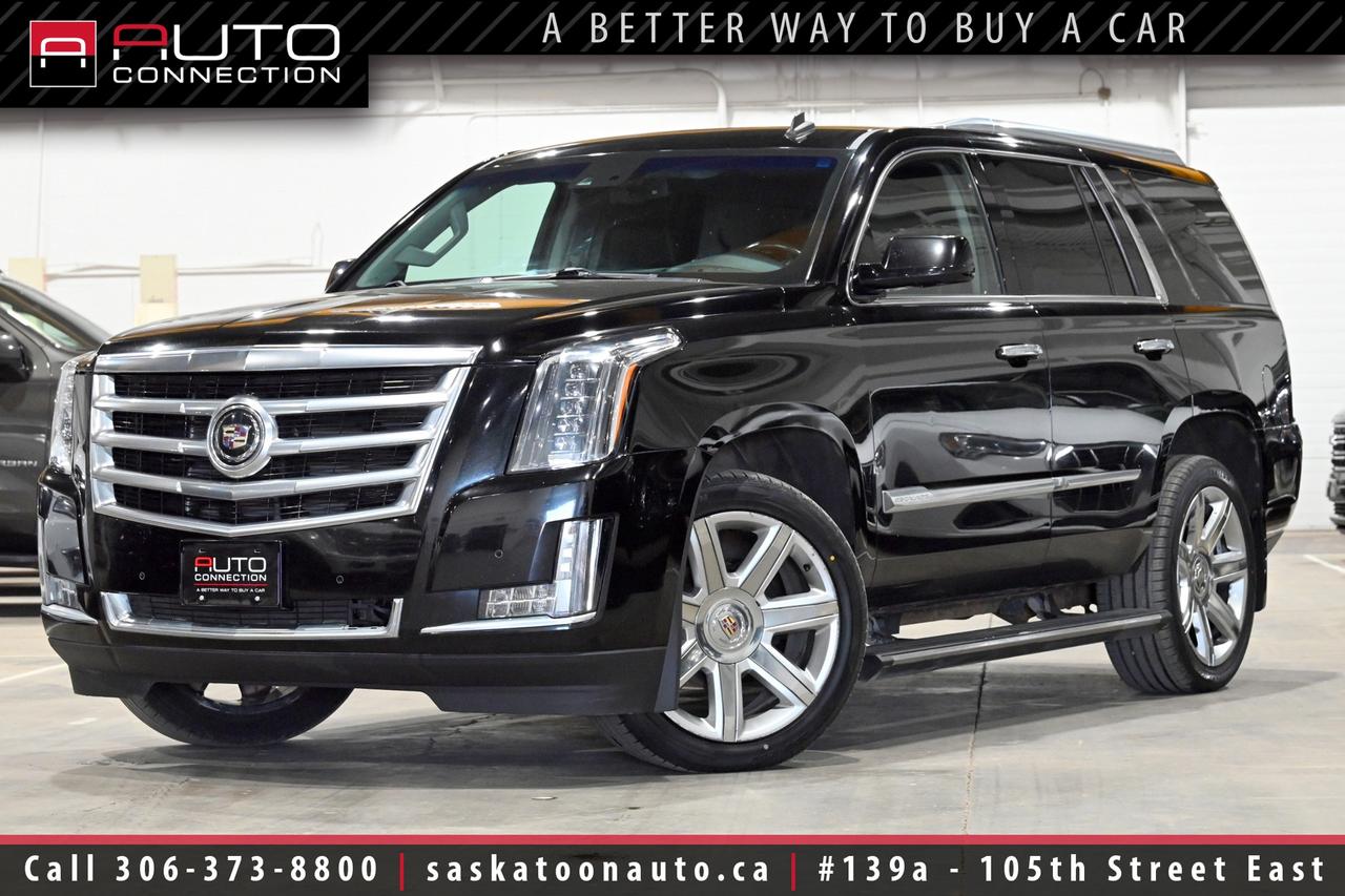 <p><font color=#000000><span>Tons of Features! - Exceptional Condition - Perfect Luxury SUV</span><br></font><span><br></span><span>Key Features:</span><span><br></span><span><br></span><span>- 4-Wheel Drive (4WD)<br>- 7-Passenger Seating<br>- Cooled & Heated Front Seats<br>- Heated 2nd-Row Seats<br>- Heated Steering Wheel<br>- Adaptive Remote Start<br>- Rear-Seat Blu-Ray System w/ 9-Inch Fold-Down Screen<br>- Head-Up Display (HUD)<br>- Wireless Charging<br>- Adaptive Cruise Control<br>- 16-Speaker Bose Centerpoint Surround Sound System<br>- Navigation<br>- Power Moonroof<br>- 12-Inch Reconfigurable Driver Information Centre Gauge Cluster<br>- 360-Degree Surround Vision Camera<br>- Front & Rear Park Assist<br>- Side Blind Zone Alert w/ Rear Cross-Traffic Alert<br>- Lane Departure Warning & Lane Change Alert<br>- Safety Alert Seat<br>- Automatic Safety Belt Tightening<br>- Forward Collision Alert<br>- Front & Rear Automatic Braking<br>- IntelliBeam Automatic High Beams<br>- 2nd & 3rd-Row Power-Release Seats<br>- RainSense Front Wipers<br>- Tri-Zone Automatic Climate Control<br>- Keyless Access<br>- OnStar w/ 4G LTE & Wi-Fi Hotspot Capability<br>- Bose Active Noise Cancellation<br>- Power-Adjustable Pedals w/ Memory<br>- Power-Folding Heated Side Mirrors<br>- Interior LED Illumination w/ Theatre Dimming<br>- Illuminating Door Handles<br>- Full LED Headlamps w/ LED Front Cornering Lamps<br>- Full LED Light Blade Taillamps<br>- Heavy-Duty Trailering Equipment<br>- Magnetic Ride Control w/ Selectable Sport Mode<br>- 8-Speed Automatic Transmission<br>- 6.2L 8-Cylinder Engine<br><br><b>Exterior Colour:</b> Black Raven<br><b>Interior Colour:</b> Jet Black Leather<br><br><b>Manufacturers Brochure:</b> </span><a href=https://xr793.com/wp-content/uploads/2022/08/2015-Cadilla-Escalade-V2.pdf target=_blank><span>https://xr793.com/wp-content/uploads/2022/08/2015-Cadilla-Escalade-V2.pdf</span></a><span><br><br></span><span>Unlock a full year of exclusive VIP benefits with your purchase! Enjoy 20% off labour, 25% off tires, free windshield stone chip repairs, and so much more. Visit saskatoonauto.ca for all the details.<br></span><span><br>Honesty Pricing eliminates the haggle hassle by providing you with our lowest possible selling price up front. In fact, it is the lowest price in our market, and we will prove it by disclosing a comprehensive market report of what our competitors are selling similar vehicles for.<br></span><span><br>This vehicle meets our Diamond Certification standard, which begins by selecting only premium quality vehicles and subjecting them to a much more comprehensive inspection process than typical dealerships use. Diamond Certified ensures a clean history, exceptional appearance and problem-free operation.<br></span><span><br>At Saskatoon Auto Connection we sell pre-owned automobiles the way we would like to buy them ourselves. Since 2008, we have been dedicated to providing the highest level of integrity and transparency in our industry, in combination with the highest quality vehicles at the most competitive prices in Saskatchewan. Our friendly staff is ready to positively redefine your expectations of the pre-owned automobile space.</span><span></span></p>