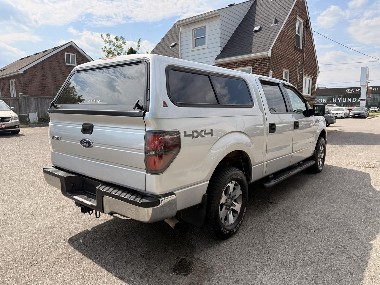 2013 Ford F-150 XLT | Crew Cab | Topper Photo