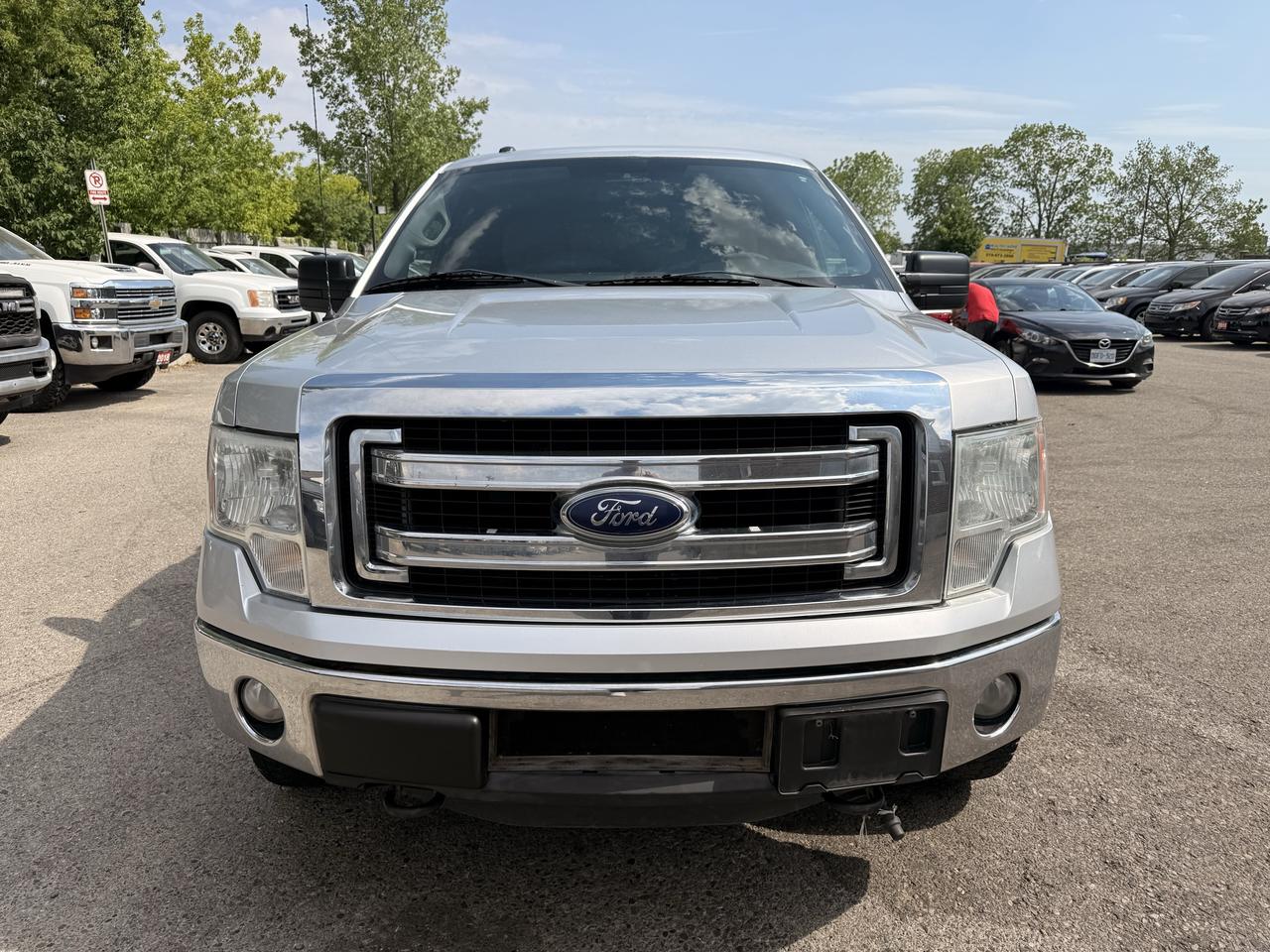 2013 Ford F-150 XLT | Crew Cab | Topper Photo