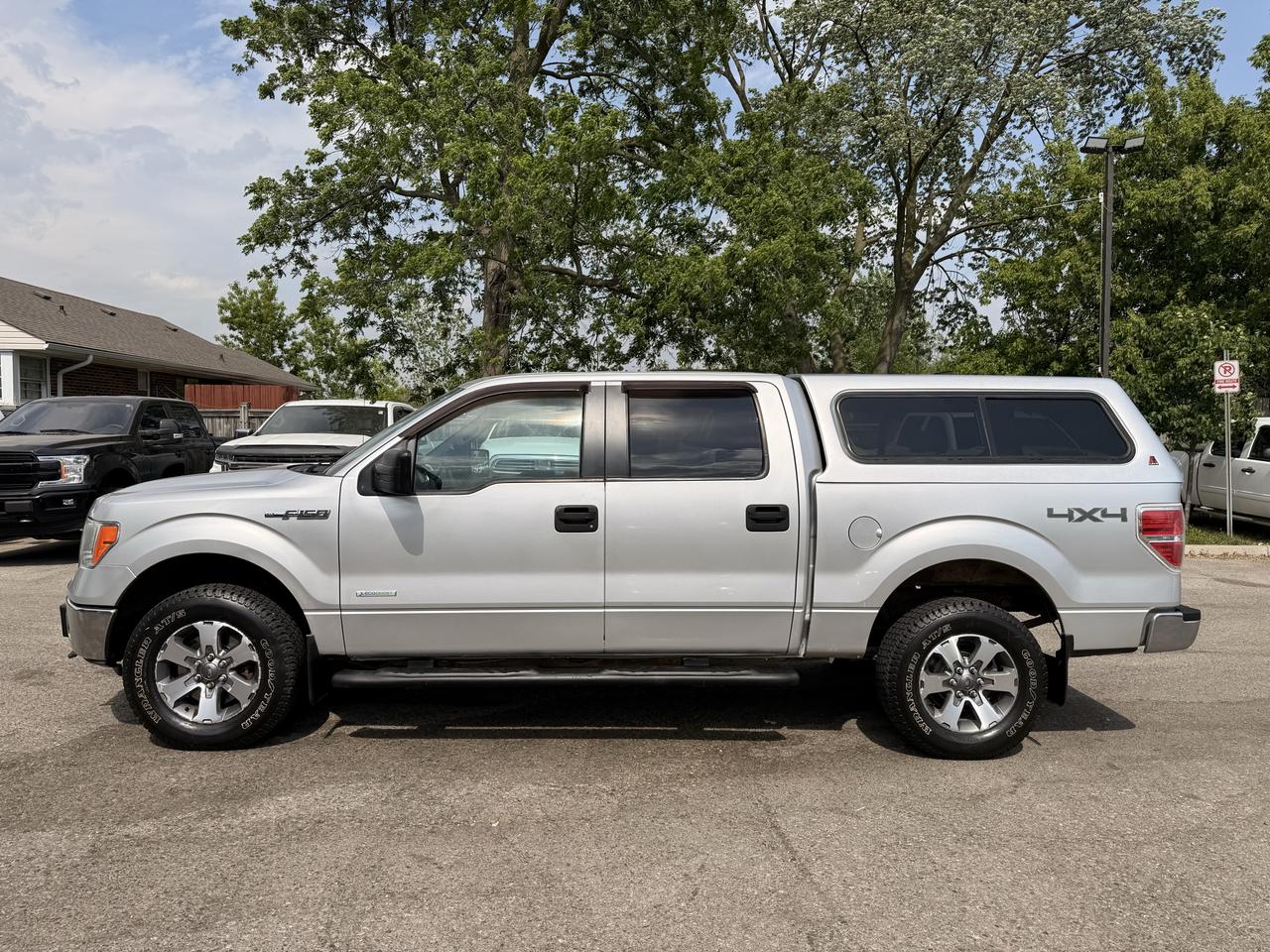 2013 Ford F-150 XLT | Crew Cab | Topper Photo
