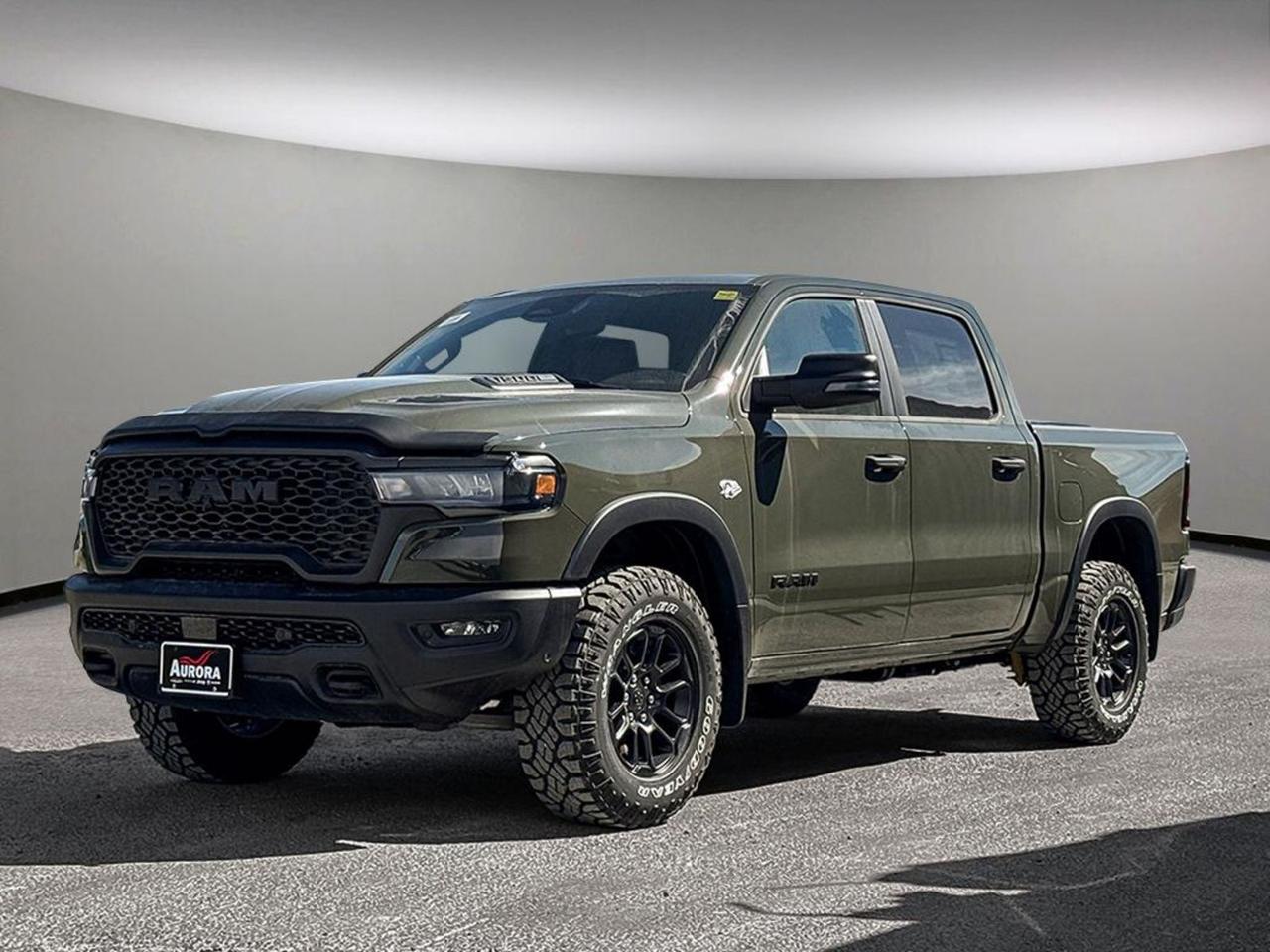 Introducing the 2026 Ram 1500 Rebel 4x4 Crew Cab 57 Box  the perfect blend of rugged capability and advanced technology. Powered by the 5.7L HEMI VVT V8 engine with eTorque and paired with an 8-speed automatic transmission, this truck delivers impressive performance and tow capacity. Its aggressive stance features 18 painted mid-gloss black wheels with all-terrain tires, while inside, enjoy comfort with heated cloth/vinyl bucket seats, a power 8-way adjustable driver seat, and a spacious rear 60/40 folding bench.Stay connected on the go with the Uconnect 5WW Navigation system displayed on a crisp 12-inch touchscreen, Apple CarPlay, Android Auto, and a 4G LTE Wi-Fi hotspot. Safety and convenience come standard with advanced driver assistance features, heated power-folding mirrors, LED lighting, and a robust off-road suspension. Whether its city streets or rugged trails, the 2026 Ram 1500 Rebel is built to impress and ready to perform. Contact us today at 888-539-7474 to test drive your next adventure!PRICING ADVERTISED IS REFLECTING THE CASH INCENTIVE AND CANNOT BE STACKED WITHLOW-RATEFINANCING, PRICING ADVERTISED CAN BE FINANCED. REACH OUT TO THE SALES TEAM TO GET YOUR QUOTE TAILORED TO HOW YOU WOULD LIKE TO BUYCALL AURORA DODGE NOW AT867-873-4222