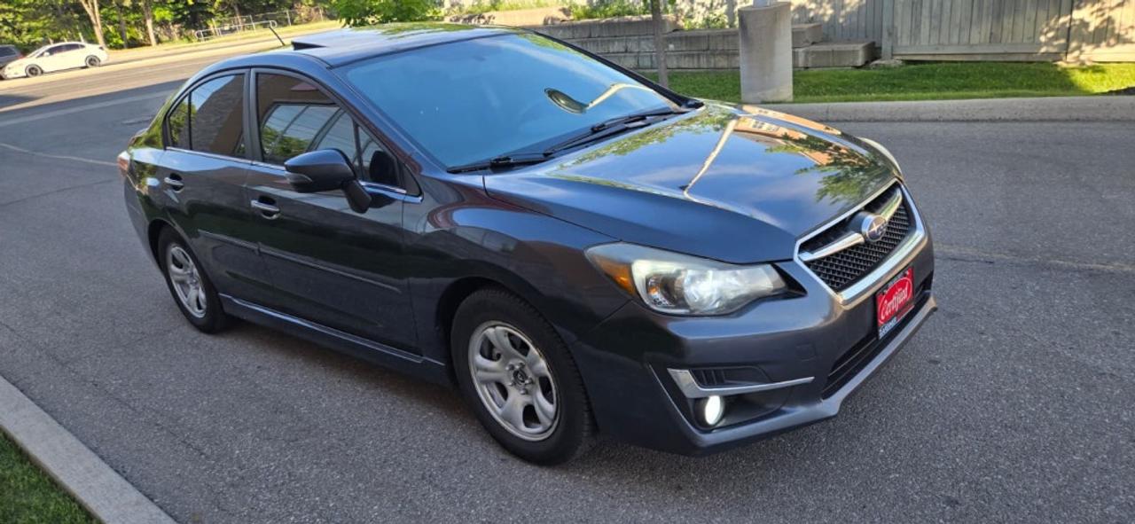 2015 Subaru Impreza 4dr Sedan 2.0i w/Limited Pkg Photo