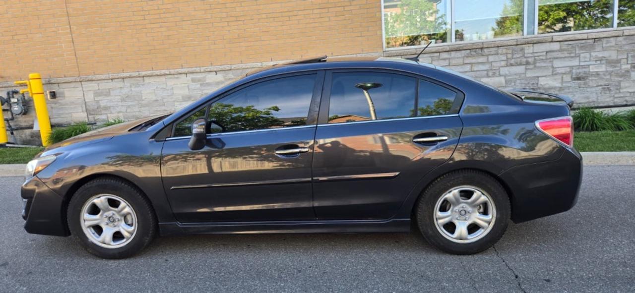 2015 Subaru Impreza 4dr Sedan 2.0i w/Limited Pkg Photo
