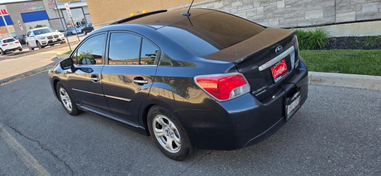 2015 Subaru Impreza 4dr Sedan 2.0i w/Limited Pkg Photo
