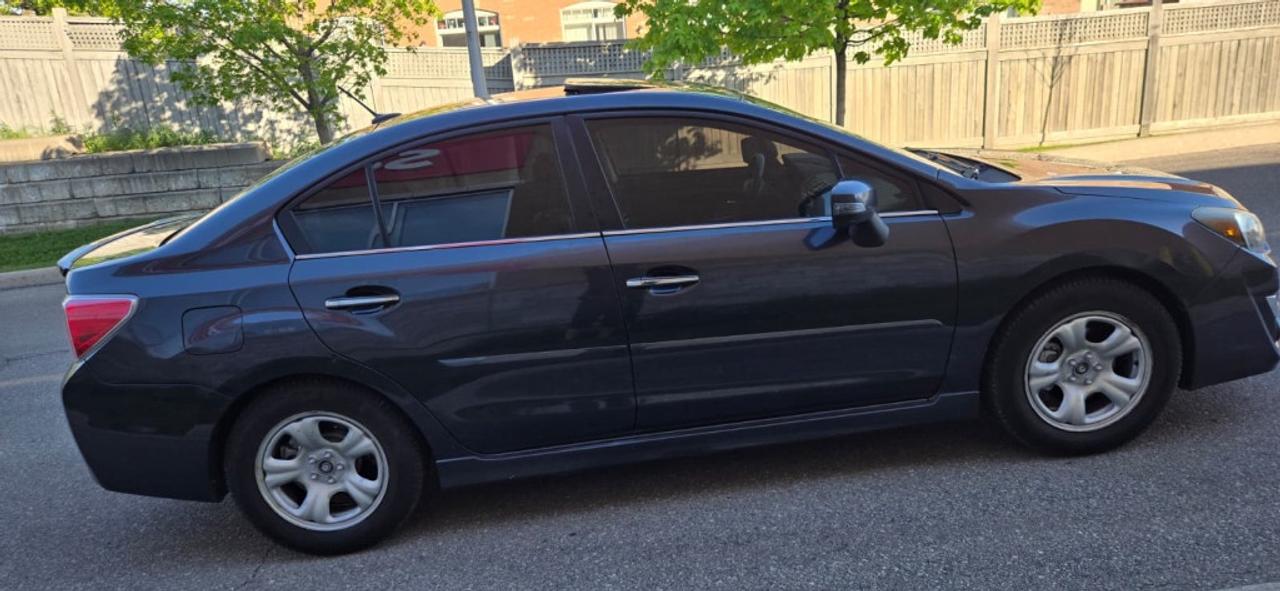 2015 Subaru Impreza 4dr Sedan 2.0i w/Limited Pkg Photo