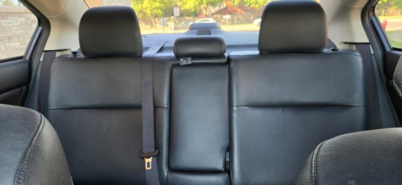 2015 Subaru Impreza 4dr Sedan 2.0i w/Limited Pkg Photo