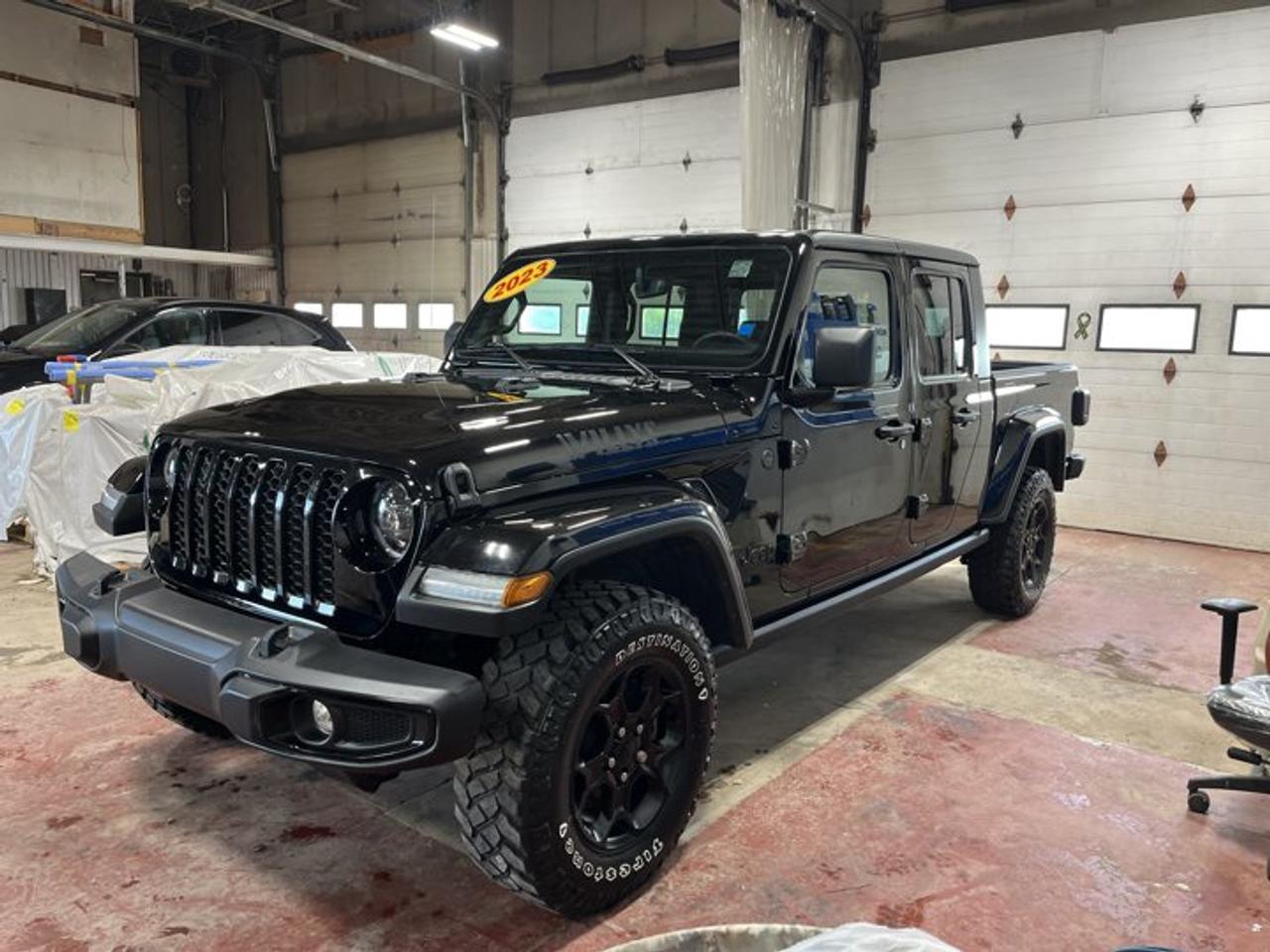 New Price!Black Clearcoat 2023 Jeep Gladiator Sport S 4WD 8-Speed Automatic Pentastar 3.6L V6 VVT1-Year SiriusXM Guardian Subscription, 1-Year SiriusXM Subscription, 115-Volt Auxiliary Power Outlet, 220-Amp Alternator, 240-Amp Alternator, 3.73 Rear Axle Ratio, 4-Wheel Disc Brakes, 4-Wheel Drive Decal, 400-Watt Inverter, 4G LTE Wi-Fi Hot Spot, 5-Year SiriusXM Traffic Subscription, 5-Year SiriusXM Travel Link Subscription, 7 In-Cluster Colour Display, 8 Speakers, 8.4 Touchscreen, A/C w/Automatic Temperature Control, ABS brakes, Air Conditioning, Alpine Premium Audio System, AM/FM radio, Apple CarPlay/Android Auto, Auto-Dimming Rear-View Mirror, Black 3-Piece Freedom Hardtop, Black Grille, Body-Colour 2-Piece Fender Flares, Brake assist, Class IV Hitch Receiver, Cloth Bucket Seats, Cold Weather Group, Compass, Console Bin Task Light, Convenience Group, Daytime Running Lights, Daytime Running Lights w/LED Accents, Deep-Tint Sunscreen Windows, Delay-off headlights, Driver door bin, Driver vanity mirror, Dual front impact airbags, Dual front side impact airbags, Dual USB Media Hubs, Electronic Stability Control, Freedom Panel Storage Bag, Front anti-roll bar, Front Bucket Seats, Front fog lights, Front Heated Seats, Front Heavy Duty Red Shock Absorbers, Front reading lights, GPS Antenna Input, GPS Navigation, HD Radio, Heated Steering Wheel, Heavy-Duty Engine Cooling, Integrated roll-over protection, LED Fog Lamps, LED Headlamp & Fog Lamp Group, LED Reflector Headlamps, Low tire pressure warning, Manual Rear Sliding Window, MOPAR All-Weather Floor Mats, MOPAR Spray-In Bedliner, Moulded-In-Colour Bumper w/Gloss Black, Normal-Duty Suspension, Occupant sensing airbag, Off-Road Information Pages, Outside temperature display, ParkView Rear Back-Up Camera, Passenger door bin, Passenger vanity mirror, Power Heated Exterior Mirrors, Power steering, Power Tailgate Lock, Power Windows w/Front 1-Touch Down, Premium-Wrapped Steering Wheel, Quick Order Package 24W Willys, Radio data system, Radio: Uconnect 4 w/7 Display, Radio: Uconnect 4C Nav w/8.4 Display, Rear anti-roll bar, Rear Heavy Duty Red Shock Absorbers, Rear reading lights, Rear Window Defroster, Remote Keyless Entry, Remote Proximity Keyless Entry, Security Alarm, SiriusXM Satellite Radio, SiriusXM Traffic, SiriusXM Travel Link, SOS Call & Roadside Assistance Call, Speed control, Speed-Sensitive Power Locks, Split folding rear seat, Steering wheel mounted audio controls, Stop/Start Dual Battery System, Sun Visors w/Illuminated Vanity Mirrors, Tachometer, Technology Group, Telescoping steering wheel, Tilt steering wheel, Trac-Lok Limited-Slip Rear Differential, Traction control, Trailer Hitch Zoom, Trailer Tow Package, Trip computer, Uconnect 4C Nav & Sound Group, Universal Garage Door Opener, Variably intermittent wipers, Wheels: 17 x 7.5 Black Aluminum, Willys, Willys Hood Decal.Certification Program Details: 80 Point Inspection Fresh Oil Change Full Vehicle Detail Full tank of Gas 2 Years Fresh MVI Brake through InspectionAt Steele GMC Buick Fredericton, were proud to be your Used Car Mega Center serving drivers all across Atlantic Canada from Fredericton, Oromocto, New Maryland, Woodstock, Saint John, and Moncton in New Brunswick, to Nova Scotia, Prince Edward Island, and Newfoundland. Our inventory features all makes and models of used cars, trucks, SUVs, and vans, giving you the best selection in the region. Whether you need a fuel-efficient sedan, a family SUV, or a rugged pickup, youll find it right here at Steele GMC Buick Fredericton. With our Market Value Pricing, every vehicle is priced based on real-time market conditions, ensuring you get the best possible deal without the hassle of negotiating. We keep pricing transparent and competitive so you can shop with total confidence. No matter your credit situation good, bad, or no credit at all youre approved. Our finance experts work with lenders across Atlantic C
