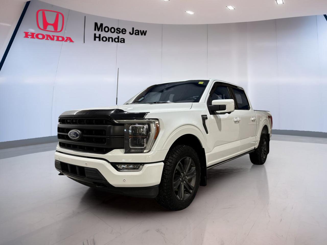 Built to handle hard work and daily life with ease, this 2023 Ford F-150 Lariat delivers strong capability, modern comfort, and trusted EcoBoost power. Offered by Moose Jaw Honda in Moose Jaw, this used full-size truck has 156,120 km and pairs a 2.7L V6 EcoBoost engine with an electronic 10-speed automatic transmission and four-wheel drive.

The 2023 Ford F-150 Lariat is well known for blending pickup toughness with a refined driving feel. Its turbocharged 2.7L V6 gives you solid low-end torque for confident passing, hauling, and highway travel. The 4WD system adds welcome traction for prairie weather, gravel roads, and changing jobsite conditions.

FEATURES OF THE F-150 Lariat
»» 2.7L EcoBoost V6 delivers strong torque
»» Electronic 10-speed automatic shifts smoothly
»» Four-wheel drive adds year-round confidence
»» Full-size cabin supports work and travel

TRUCK FEATURES
»» Strong towing capability when properly equipped
»» Durable pickup box supports daily hauling
»» Four-wheel drive helps on rough terrain
»» Built for work, travel, and towing

ADVANCED SAFETY FEATURES
»» Strong body structure supports occupant protection
»» Four-wheel disc brakes aid controlled stopping
»» Traction support helps on slippery roads
»» Stability control improves driving confidence

PERFORMANCE AND EFFICIENCY
»» 2.7L EcoBoost balances power and efficiency
»» Turbocharged V6 responds well under load
»» 10-speed automatic supports smoother acceleration
»» Four-wheel drive boosts all-weather capability

COMFORT AND CONVENIENCE
»» Spacious cabin suits daily driving needs
»» Four full doors ease passenger access
»» Smooth transmission helps relaxed highway cruising
»» Practical layout supports workday usability

TECHNOLOGY AND CONNECTIVITY
»» Driver information display keeps data visible
»» Modern controls are easy to reach
»» Automatic transmission enhances everyday operation
»» Cabin design supports intuitive use

CARGO SPACE
»» Pickup bed handles tools and gear
»» Large cabin adds interior storage flexibility
»» Useful space for work or weekends
»» Truck design supports versatile hauling needs

AWARDS & RECOGNITIONS
»» Best Buy Award, The Car Guide, 2023
»» Best Full-Size Pickup, AutoTrader Canada Awards, 2023

WHAT OTHER OWNERS LIKE
»» Strong EcoBoost power for daily driving
»» Smooth shifting from the 10-speed automatic
»» Confident four-wheel drive in winter
»» Comfortable ride for a full-size truck

This 2023 Ford F-150 Lariat is a smart choice for drivers who need real truck utility without giving up comfort and everyday drivability. Its proven EcoBoost engine, capable 4WD system, and versatile full-size design make it ready for commuting, towing, and jobsite duty alike.

For shoppers in Moose Jaw looking for a dependable used pickup, this 2023 Ford F-150 Lariat brings the strength and flexibility expected from one of Canadas most trusted trucks. With its solid feature set and capable powertrain, it is ready to get to work.

This 2023 Ford F-150 Lariats VIN is: 1FTFW1EP9PFC71680.<p>120 km and pairs a 2.7L V6 EcoBoost engine with an electronic 10-speed automatic transmission and four-wheel drive.

The 2023 Ford F-150 Lariat is well known for blending pickup toughness with a refined driving feel. Its turbocharged 2.7L V6 gives you solid low-end torque for confident passing</p>
<p> and changing jobsite conditions.

FEATURES OF THE F-150 Lariat
»» 2.7L EcoBoost V6 delivers strong torque
»» Electronic 10-speed automatic shifts smoothly
»» Four-wheel drive adds year-round confidence
»» Full-size cabin supports work and travel

TRUCK FEATURES
»» Strong towing capability when properly equipped
»» Durable pickup box supports daily hauling
»» Four-wheel drive helps on rough terrain
»» Built for work</p>
<p> and towing

ADVANCED SAFETY FEATURES
»» Strong body structure supports occupant protection
»» Four-wheel disc brakes aid controlled stopping
»» Traction support helps on slippery roads
»» Stability control improves driving confidence

PERFORMANCE AND EFFICIENCY
»» 2.7L EcoBoost balances power and efficiency
»» Turbocharged V6 responds well under load
»» 10-speed automatic supports smoother acceleration
»» Four-wheel drive boosts all-weather capability

COMFORT AND CONVENIENCE
»» Spacious cabin suits daily driving needs
»» Four full doors ease passenger access
»» Smooth transmission helps relaxed highway cruising
»» Practical layout supports workday usability

TECHNOLOGY AND CONNECTIVITY
»» Driver information display keeps data visible
»» Modern controls are easy to reach
»» Automatic transmission enhances everyday operation
»» Cabin design supports intuitive use

CARGO SPACE
»» Pickup bed handles tools and gear
»» Large cabin adds interior storage flexibility
»» Useful space for work or weekends
»» Truck design supports versatile hauling needs

AWARDS & RECOGNITIONS
»» Best Buy Award</p>
<p> 2023

WHAT OTHER OWNERS LIKE
»» Strong EcoBoost power for daily driving
»» Smooth shifting from the 10-speed automatic
»» Confident four-wheel drive in winter
»» Comfortable ride for a full-size truck

This 2023 Ford F-150 Lariat is a smart choice for drivers who need real truck utility without giving up comfort and everyday drivability. Its proven EcoBoost engine</p>
<p> this 2023 Ford F-150 Lariat brings the strength and flexibility expected from one of Canadas most trusted trucks. With its solid feature set and capable powertrain</p>
